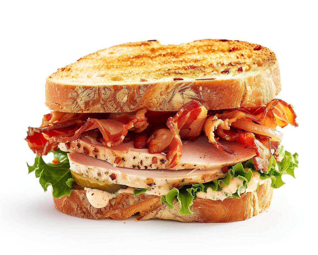 a sandwich with bacon, lettuce and tomato photo