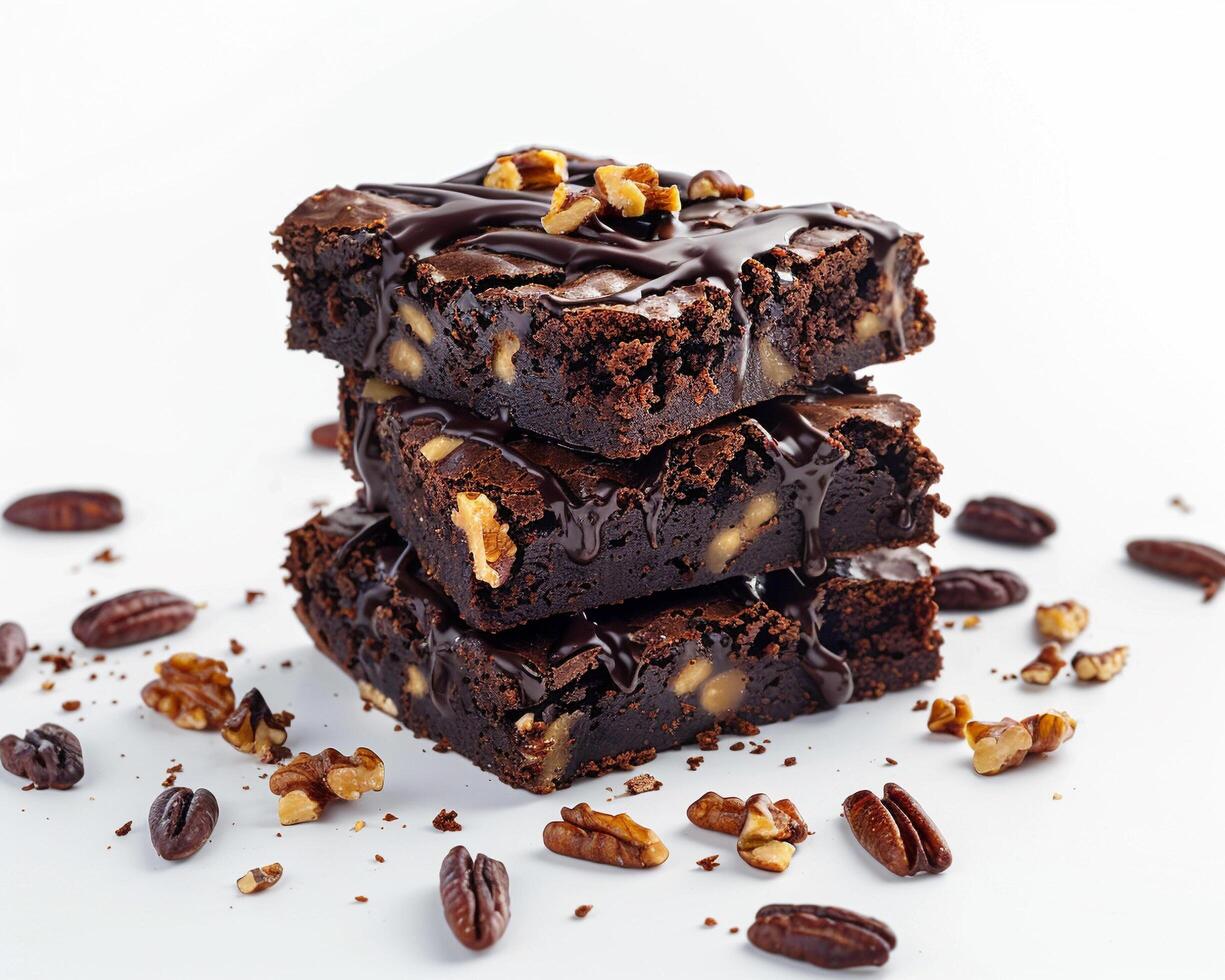 a stack of brownies with nuts on top photo
