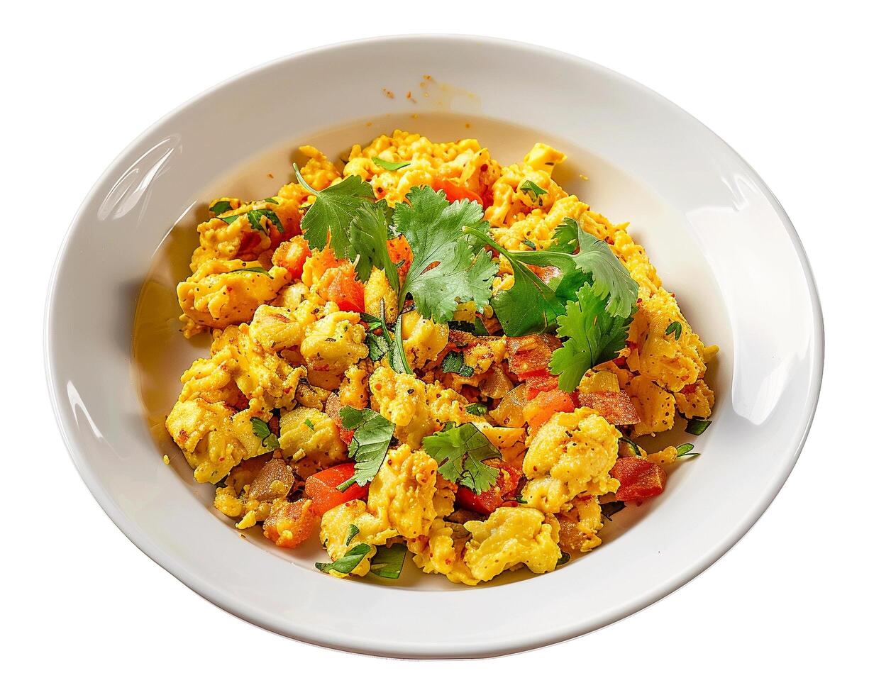 a plate of scrambled eggs with vegetables and cilantro photo