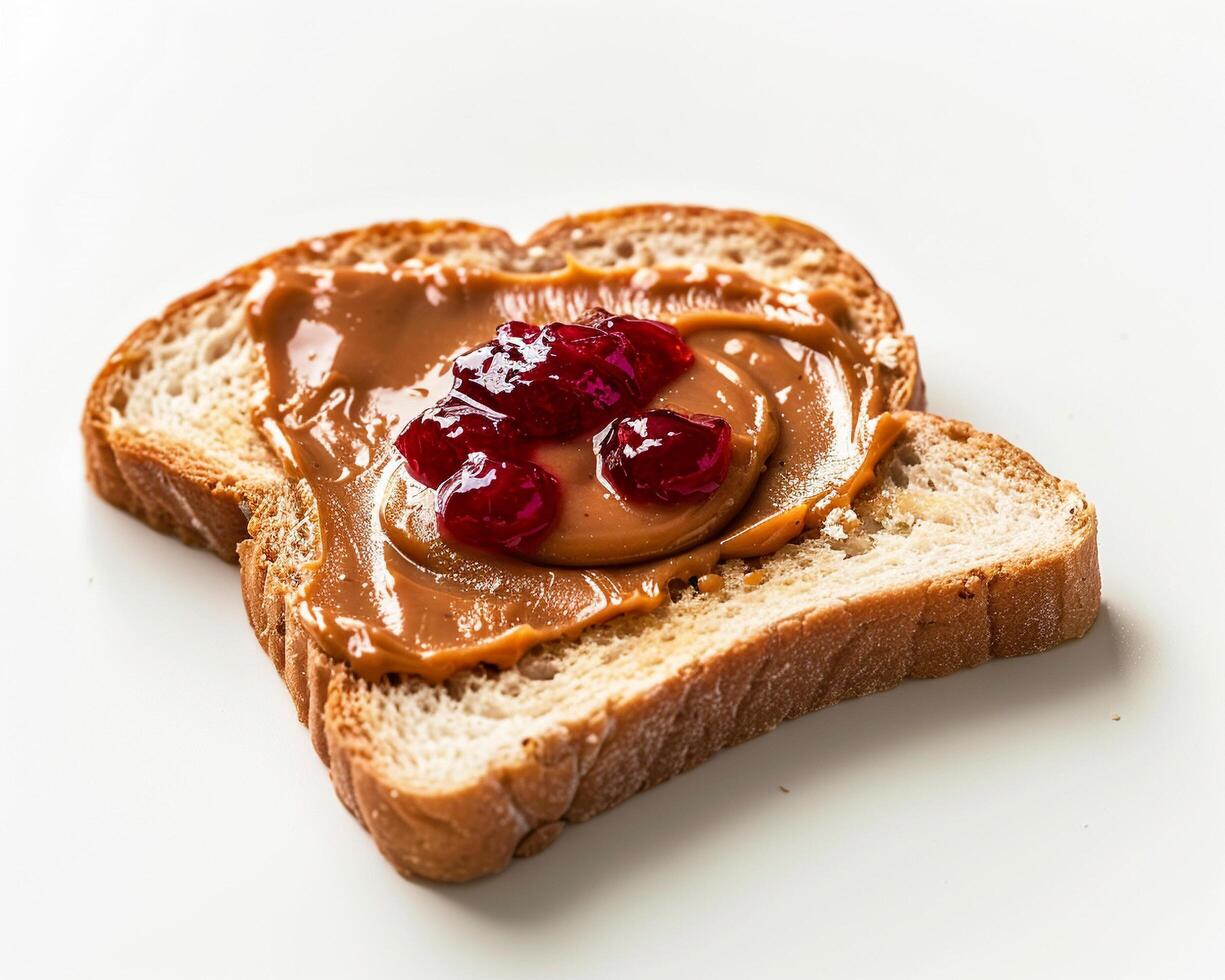 a piece of bread with peanut butter and jelly photo