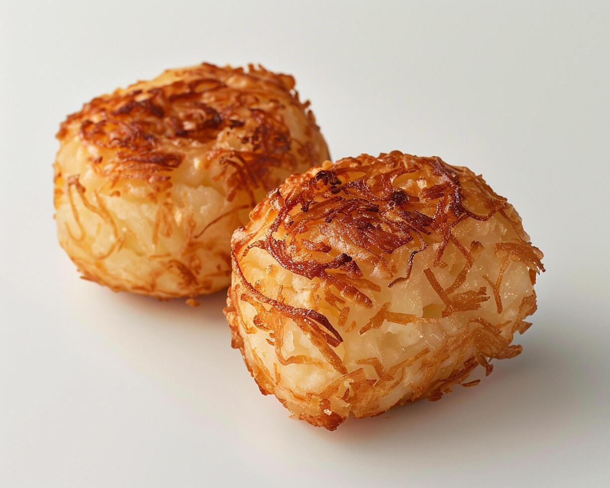 two coconut balls sitting on top of each other photo
