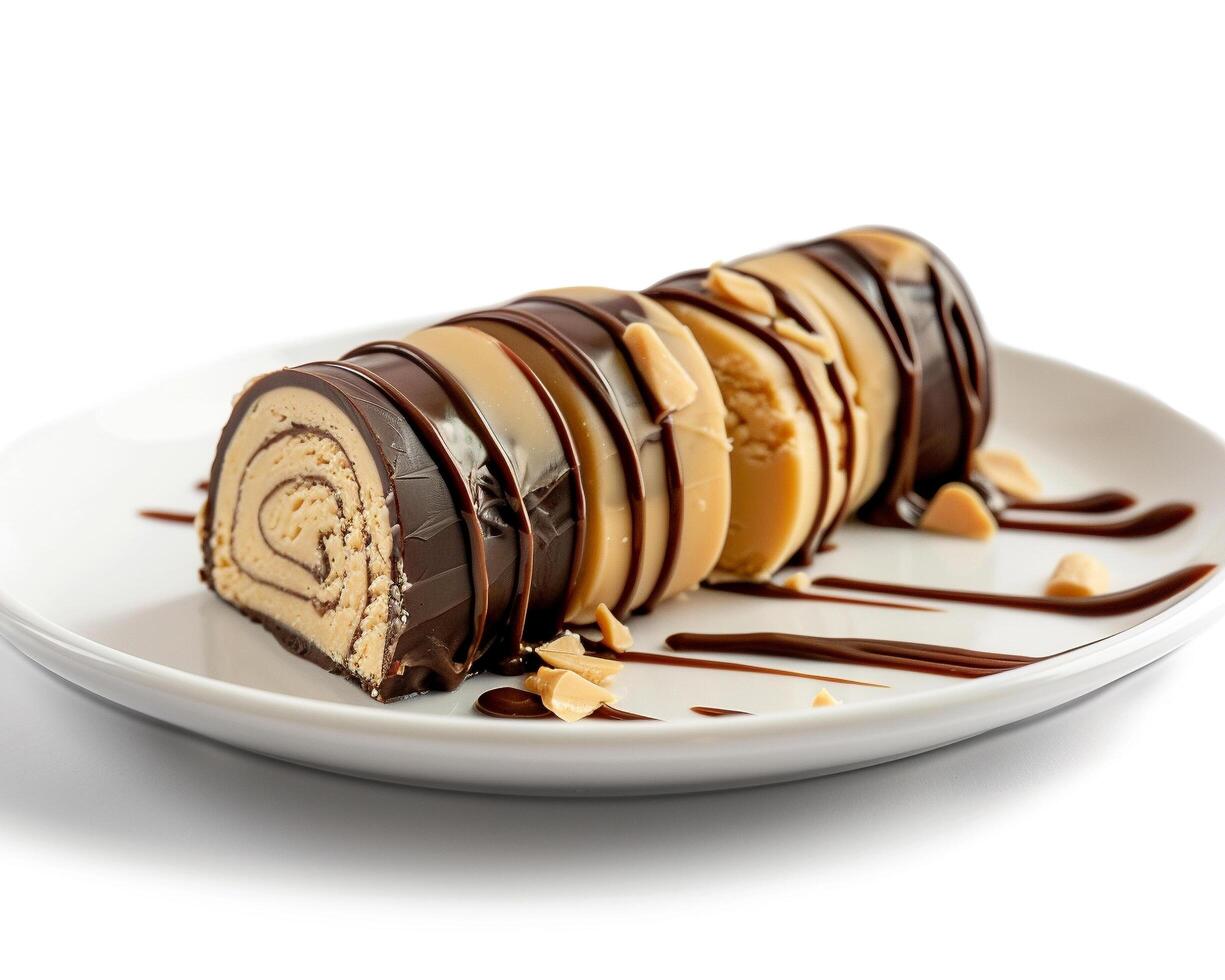 a chocolate roll with peanut butter drizzle on it photo
