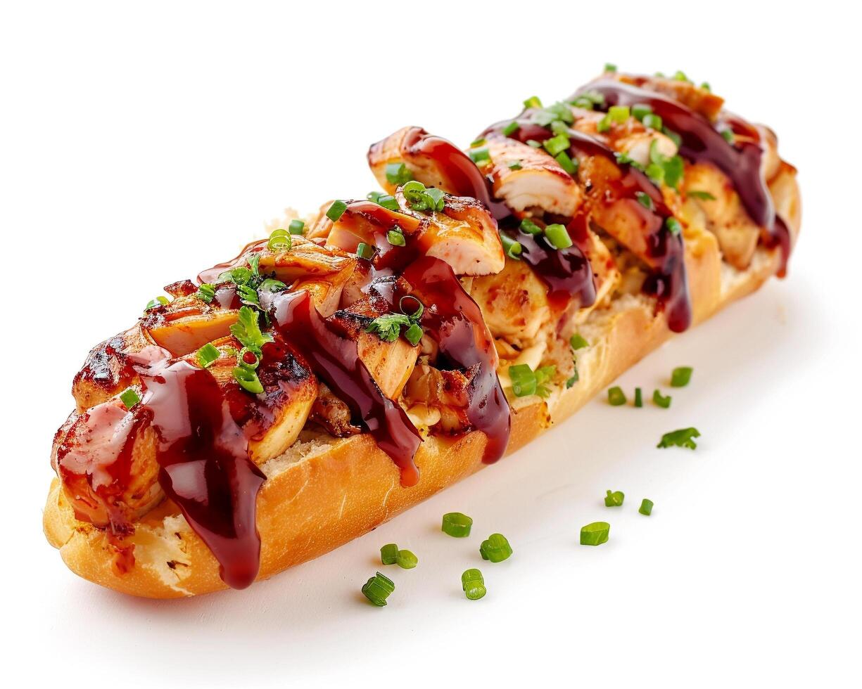 a long sandwich with bbq sauce on it photo