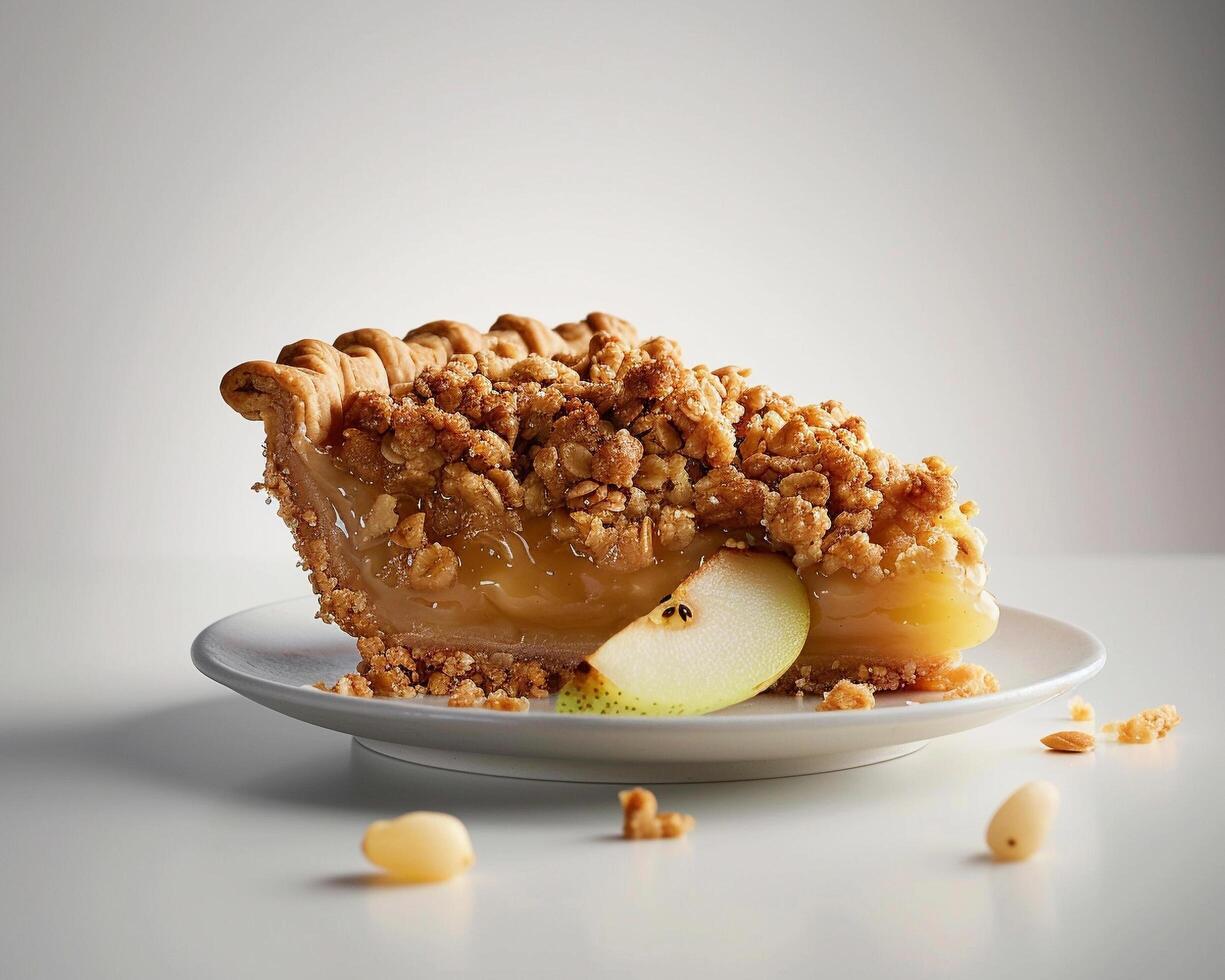 a piece of pie on a plate with a piece of apple photo