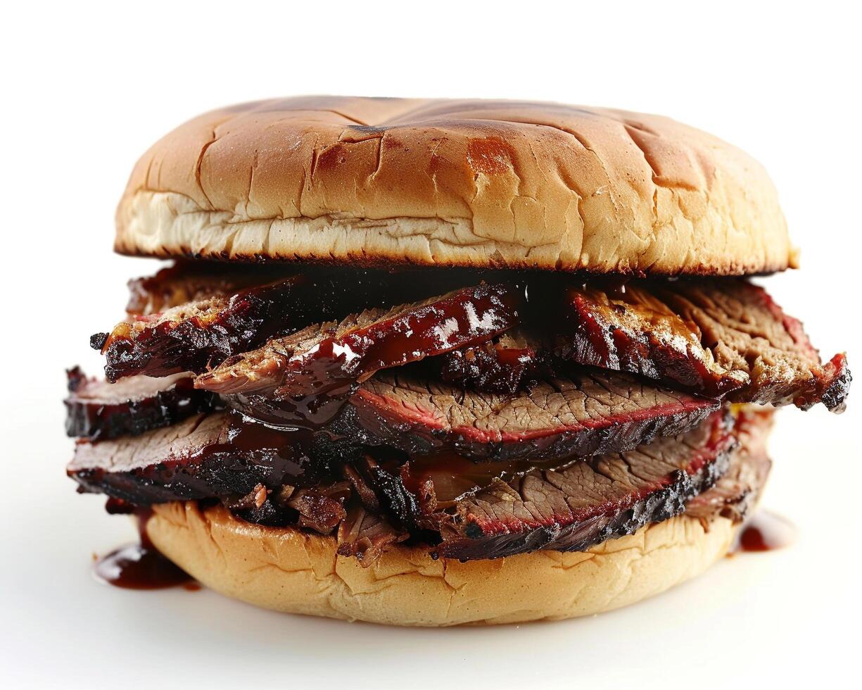 a bbq sandwich with meat and sauce on a white background photo