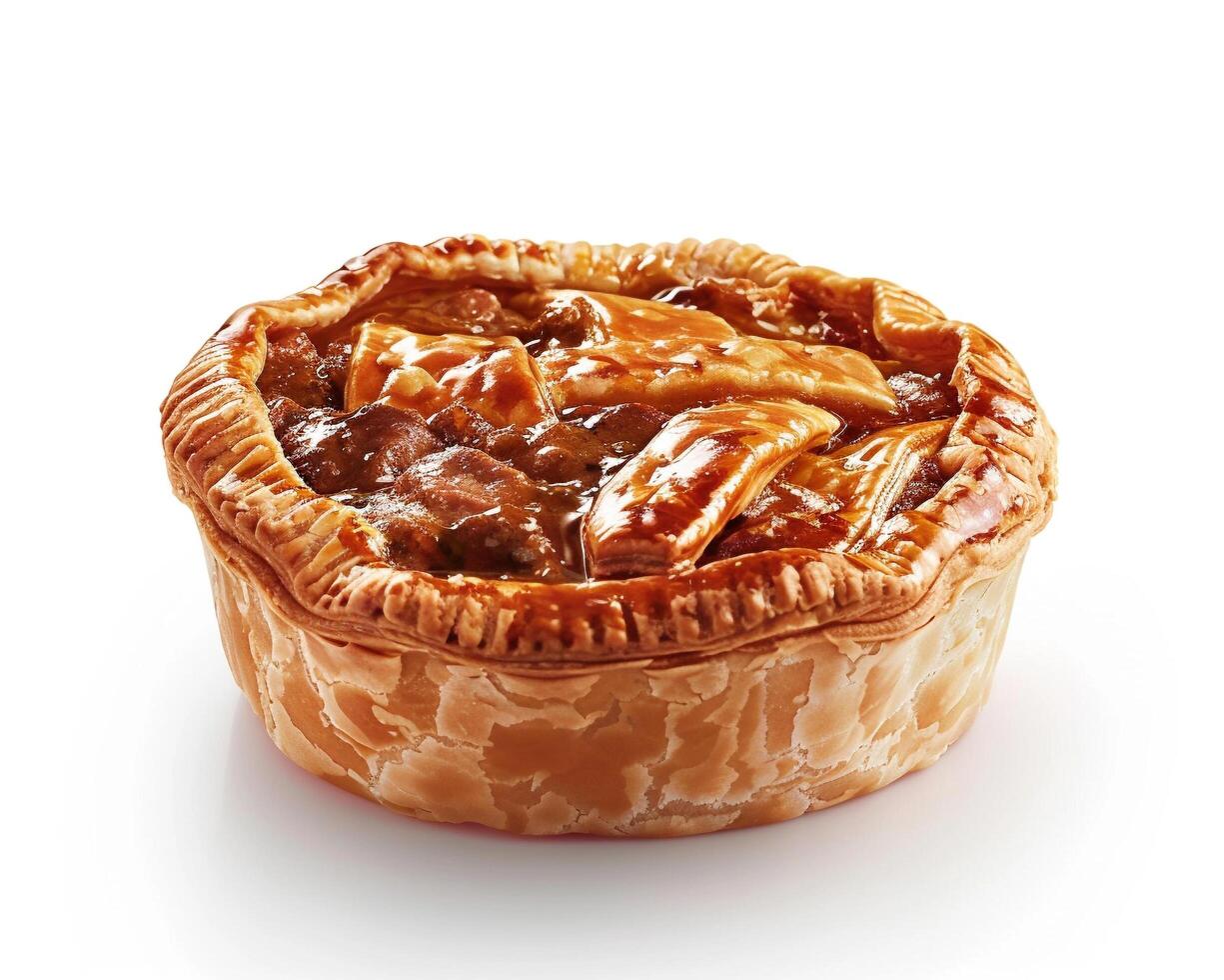 a pie with meat and gravy on a white background photo
