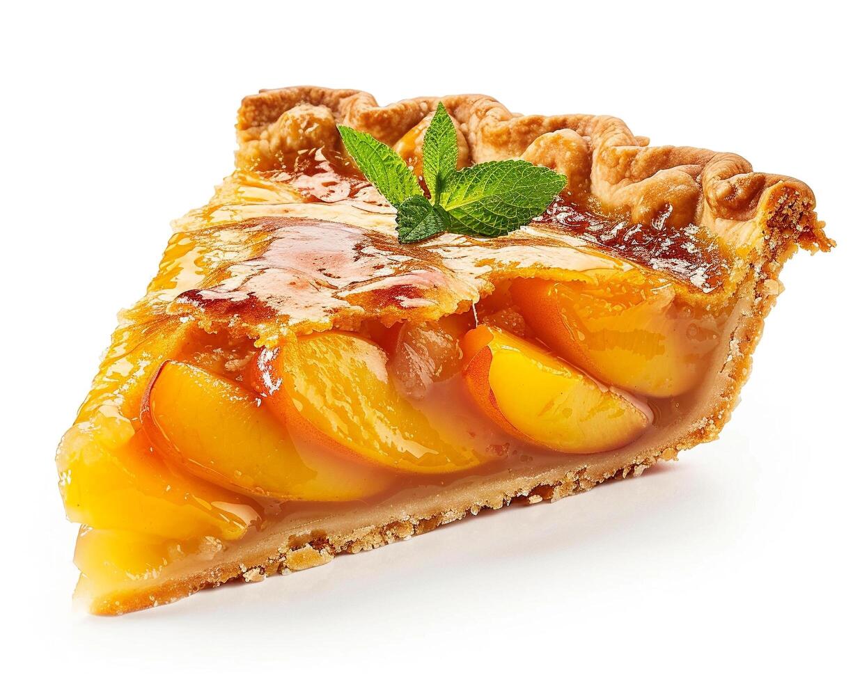 a slice of peach pie with a mint leaf on top photo