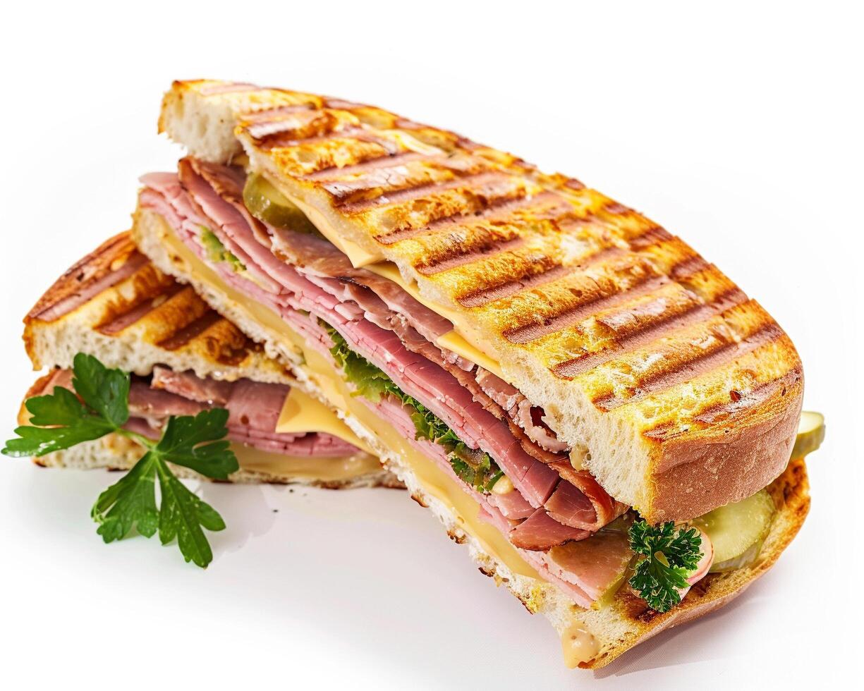 a sandwich with meat and vegetables on a white surface photo