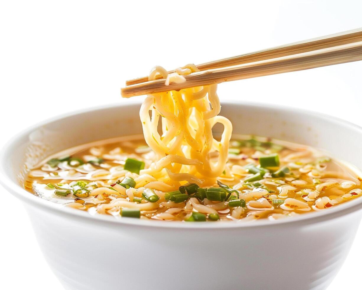 chopsticks in bowl of ramen photo