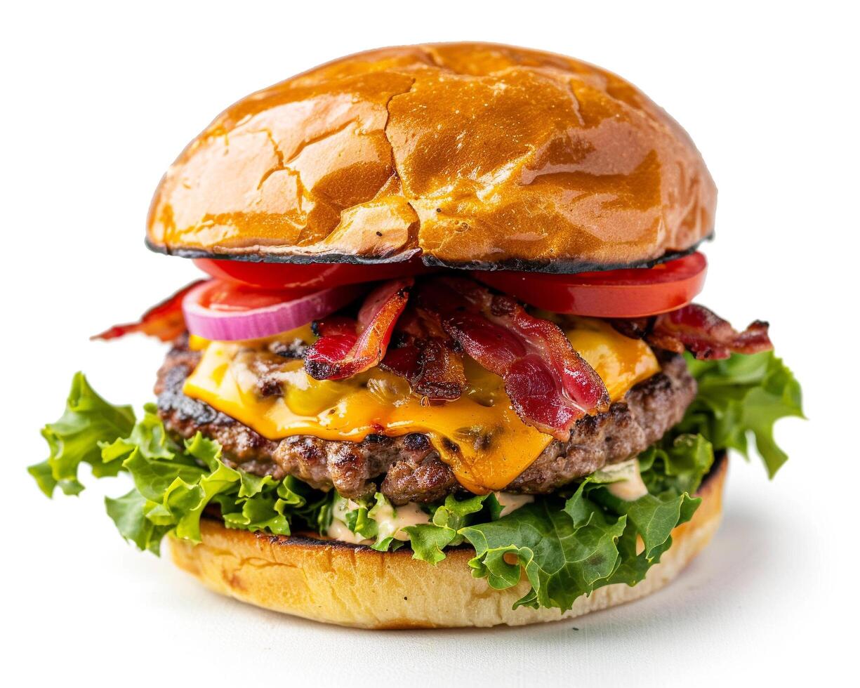 a hamburger with cheese, bacon, lettuce and tomato photo