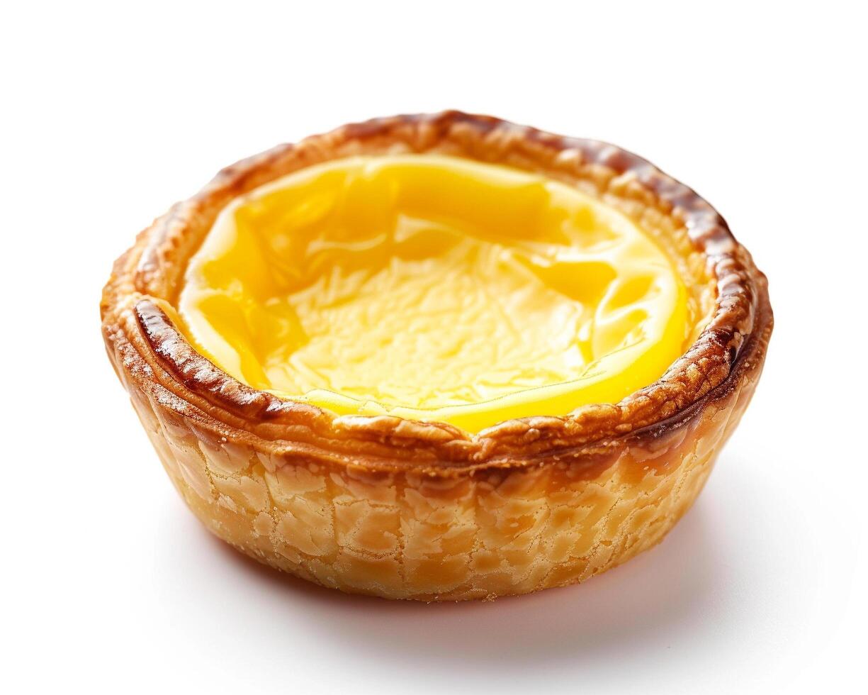 a pastry with yellow custard on top photo