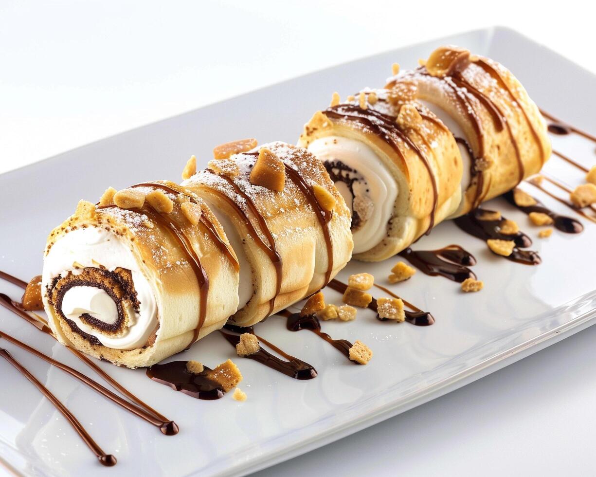 a roll of pastry with chocolate sauce and nuts photo