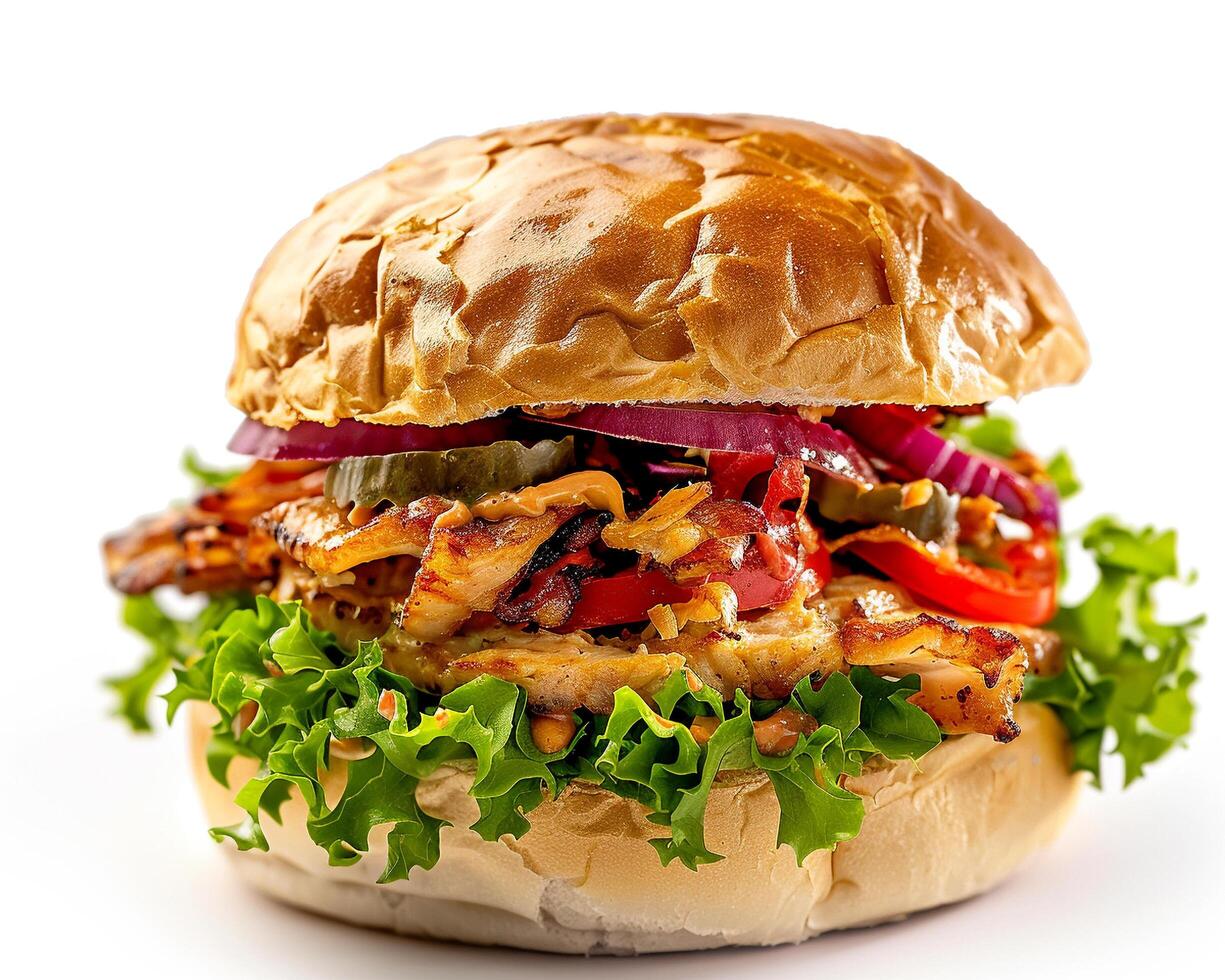 a large sandwich with lettuce and meat on a white background photo