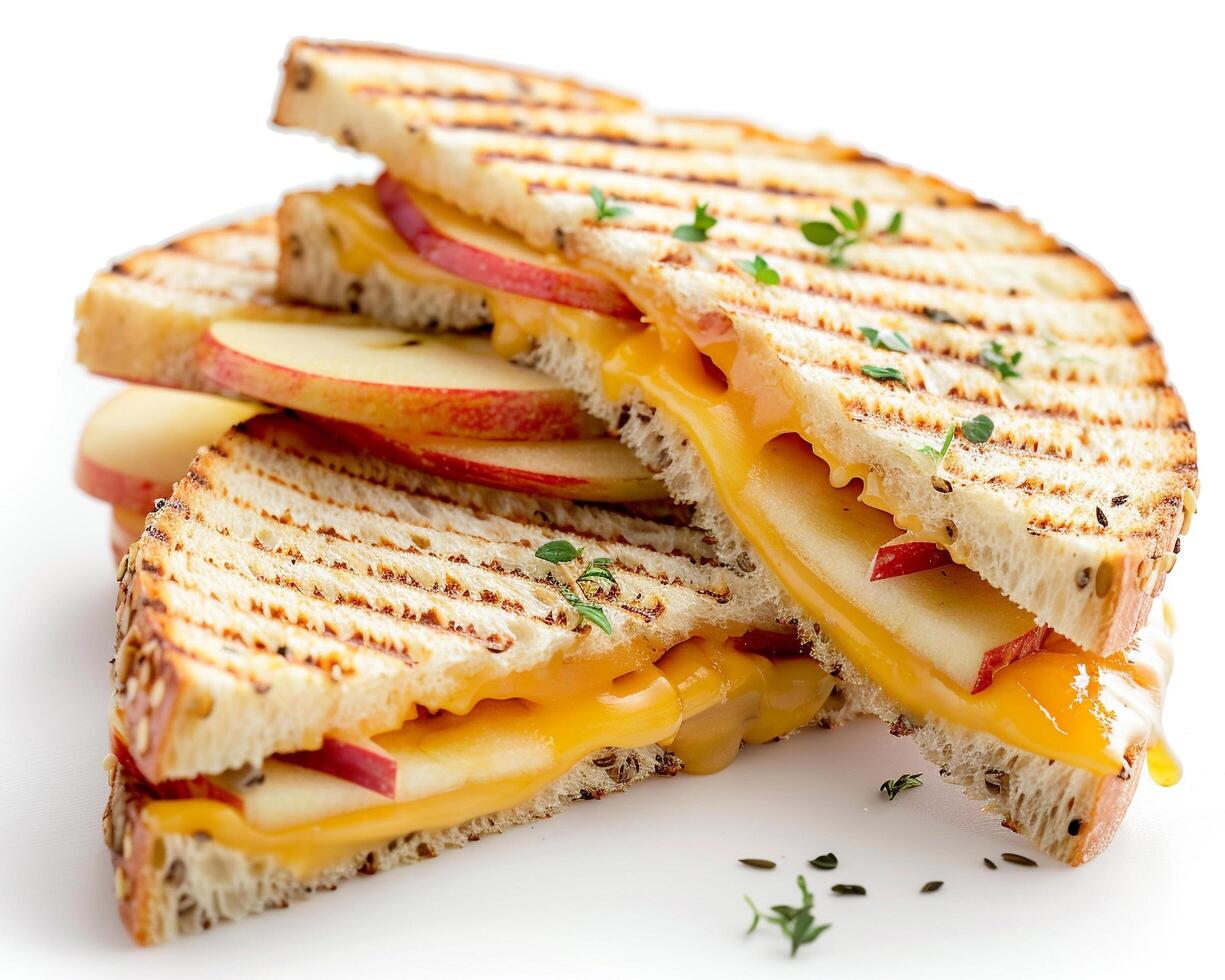 a grilled cheese sandwich with apples and cheese photo