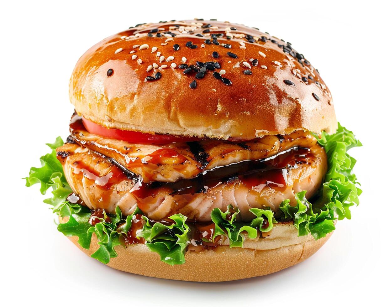 a hamburger with chicken and lettuce on a bun photo