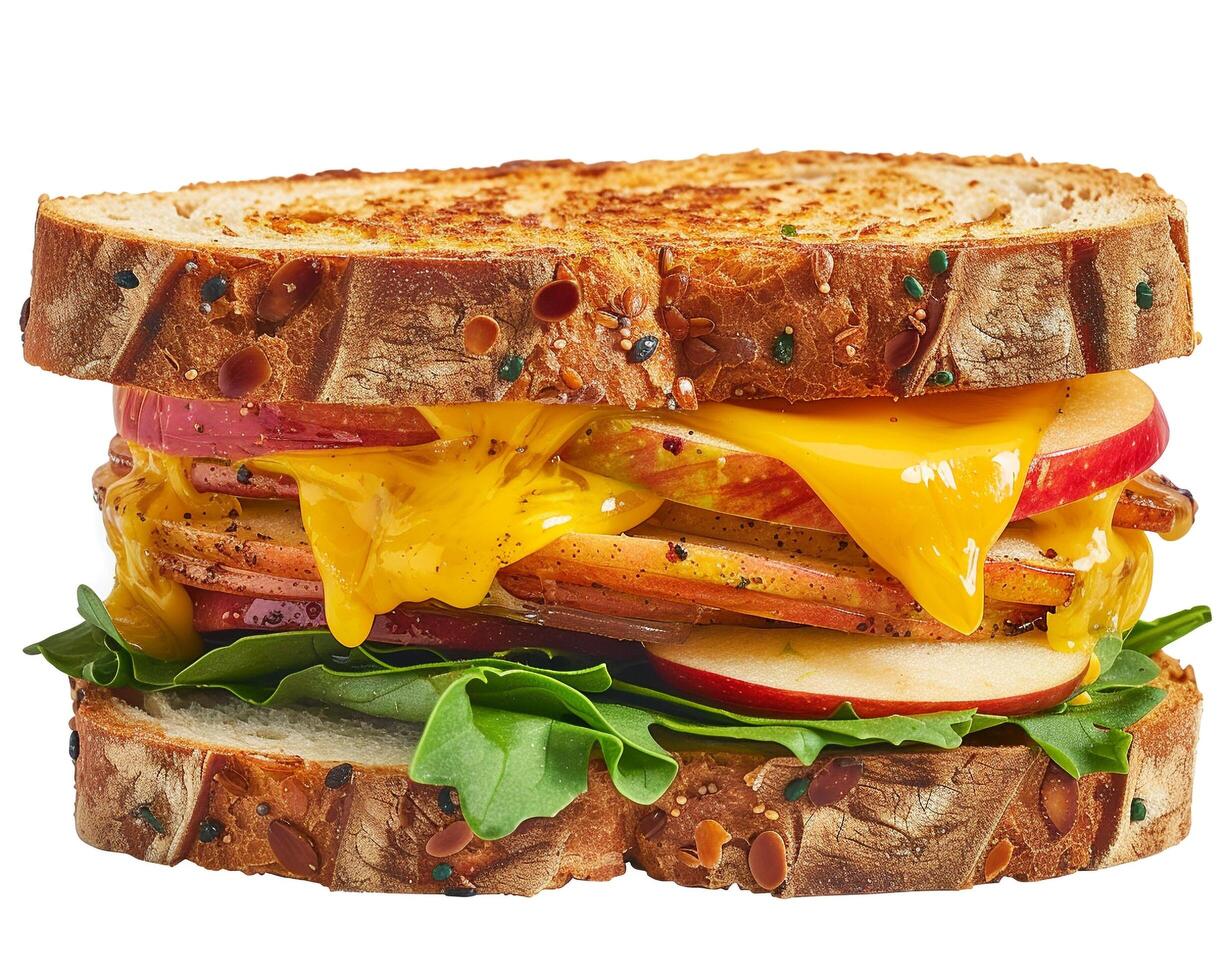 a sandwich with cheese and apples on it photo