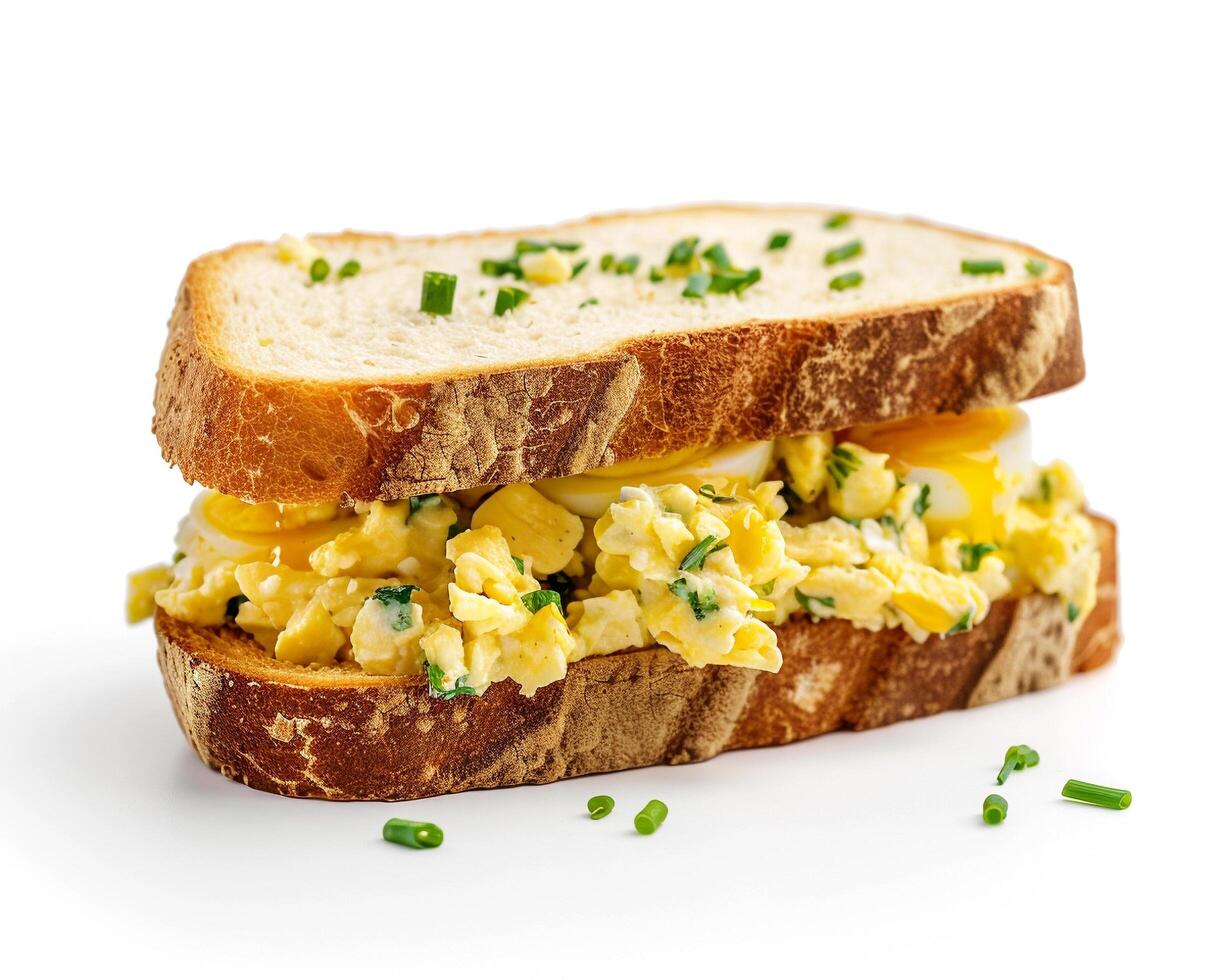 a sandwich with eggs and cheese on it photo