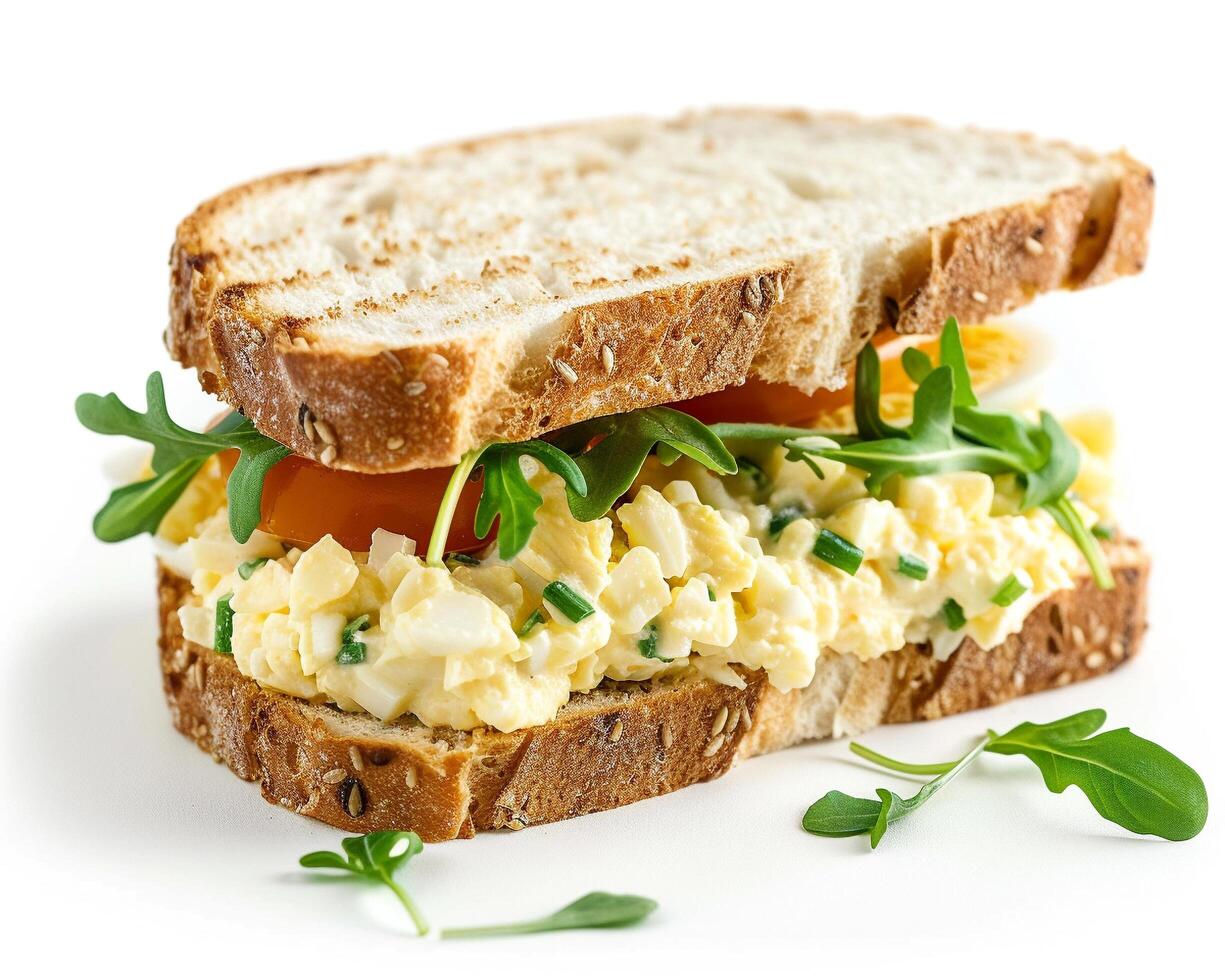 a sandwich with egg salad on it photo