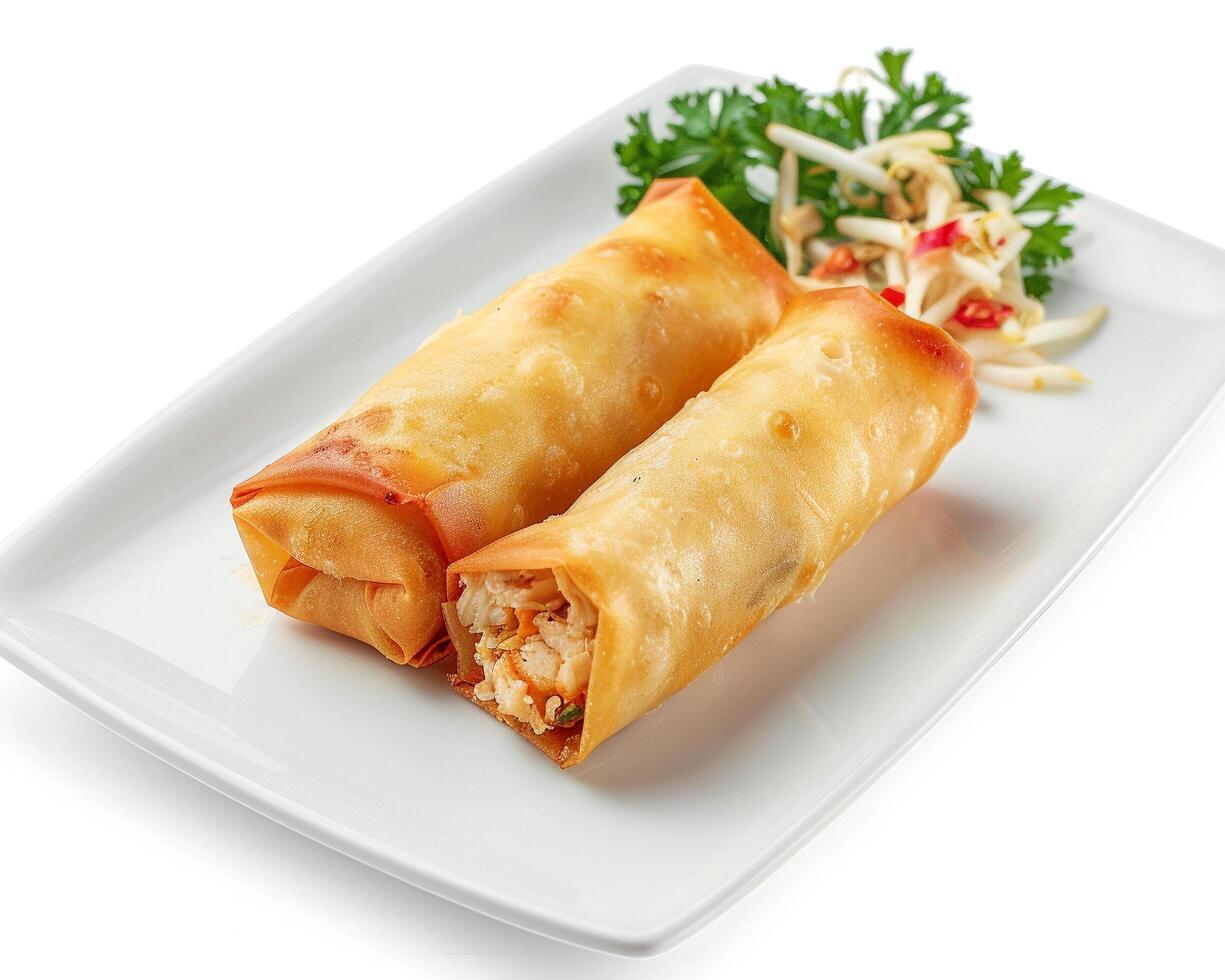 chicken spring rolls with vegetables on a white plate photo
