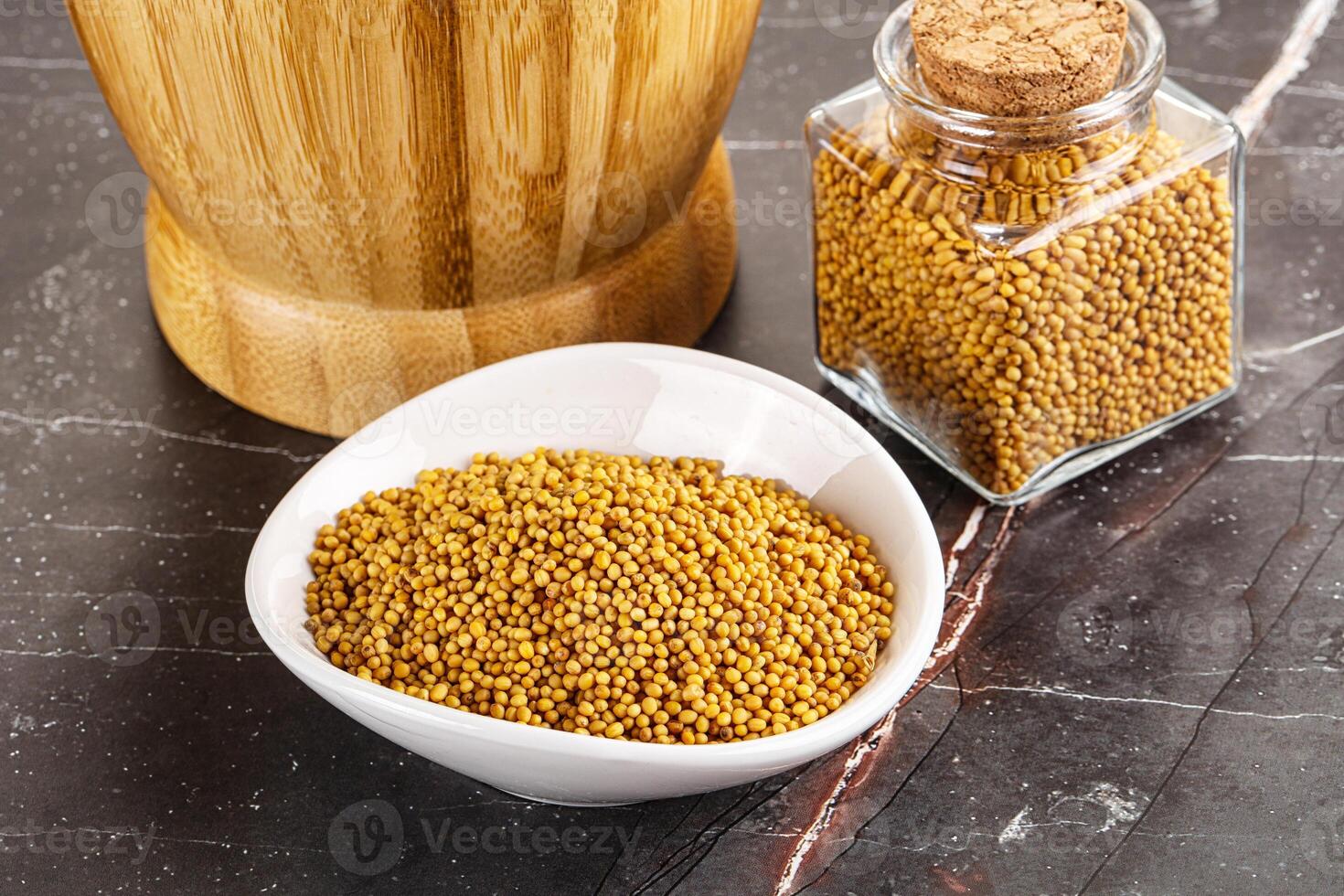 Mustard dry seeds in the bowl photo