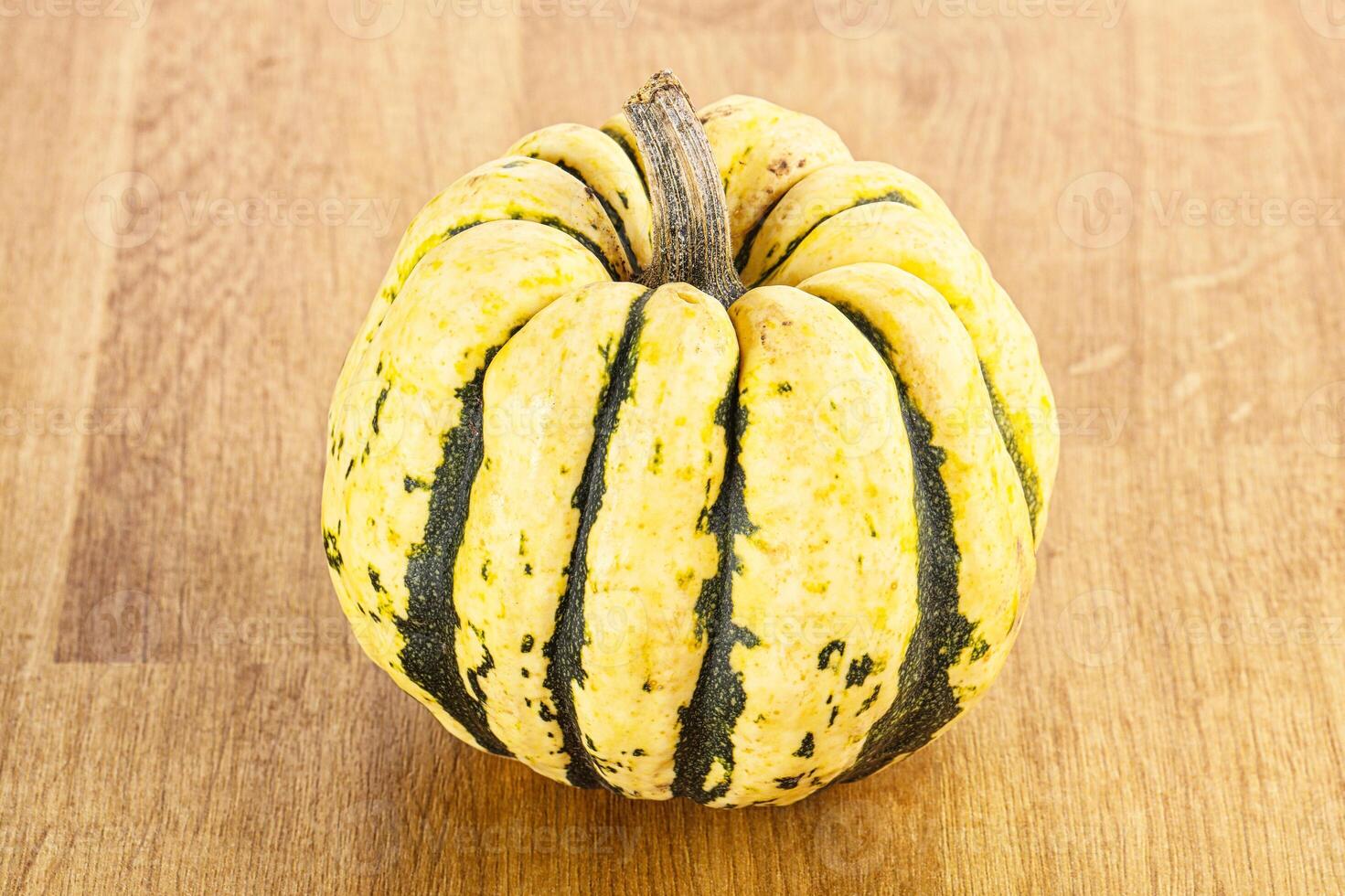 Ripe raw fresh decorative pumpkin photo