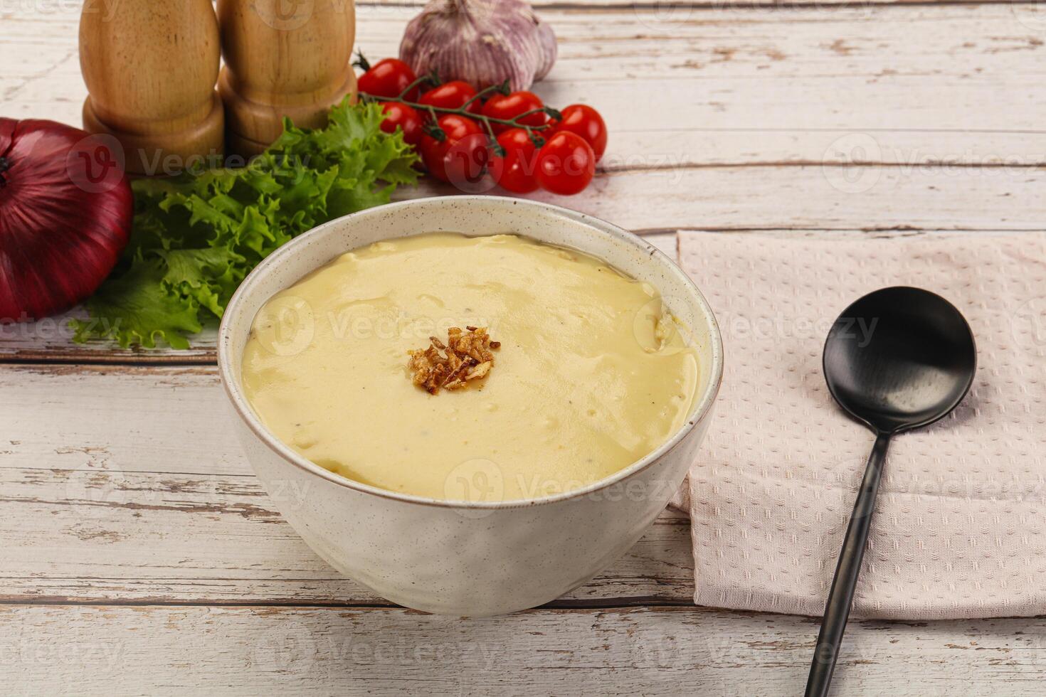 Gourmet cheese soup in the bowl photo