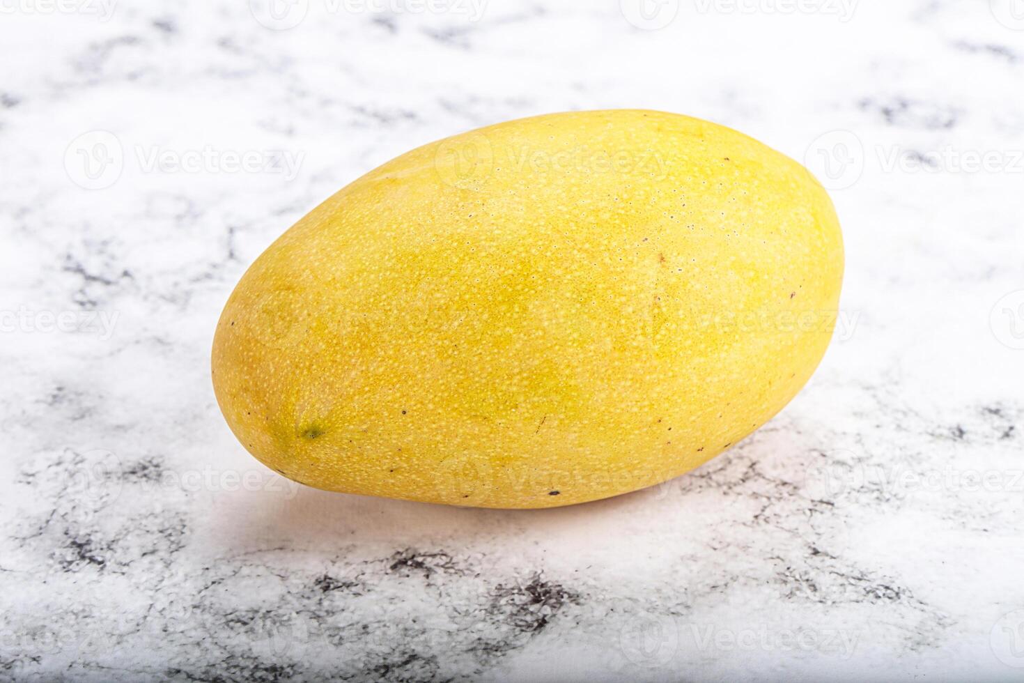Sweet ripe juicy tropical mango fruit photo