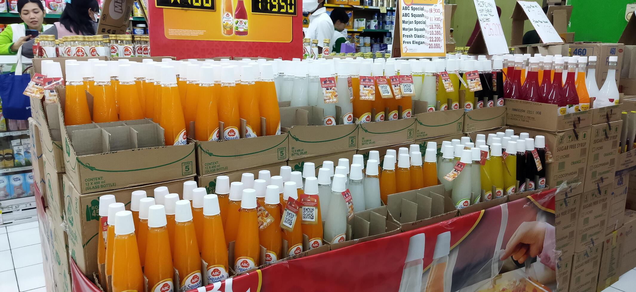 Surakarta, Indonesia, March 11, 2023. Stock of various kinds of syrup in the supermarket to welcome the month of Ramadan and Eid al-Fitr. Luwes Mall. photo
