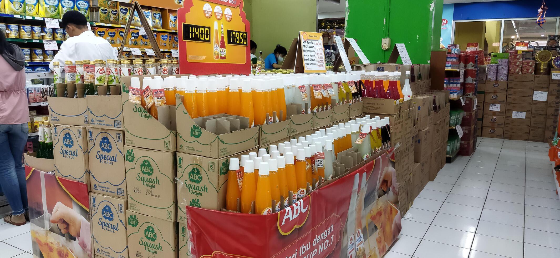 Surakarta, Indonesia, March 11, 2023. Stock of various kinds of syrup in the supermarket to welcome the month of Ramadan and Eid al-Fitr. Luwes Mall. photo