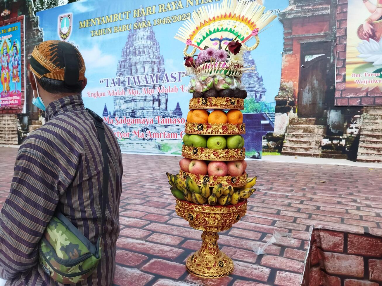 Surakarta, Indonesia, March 18, 2023. Gebogan, pajegan is a form of offering by Hindus in Bali in the form of an arrangement and arrangement of fruit and flowers. photo
