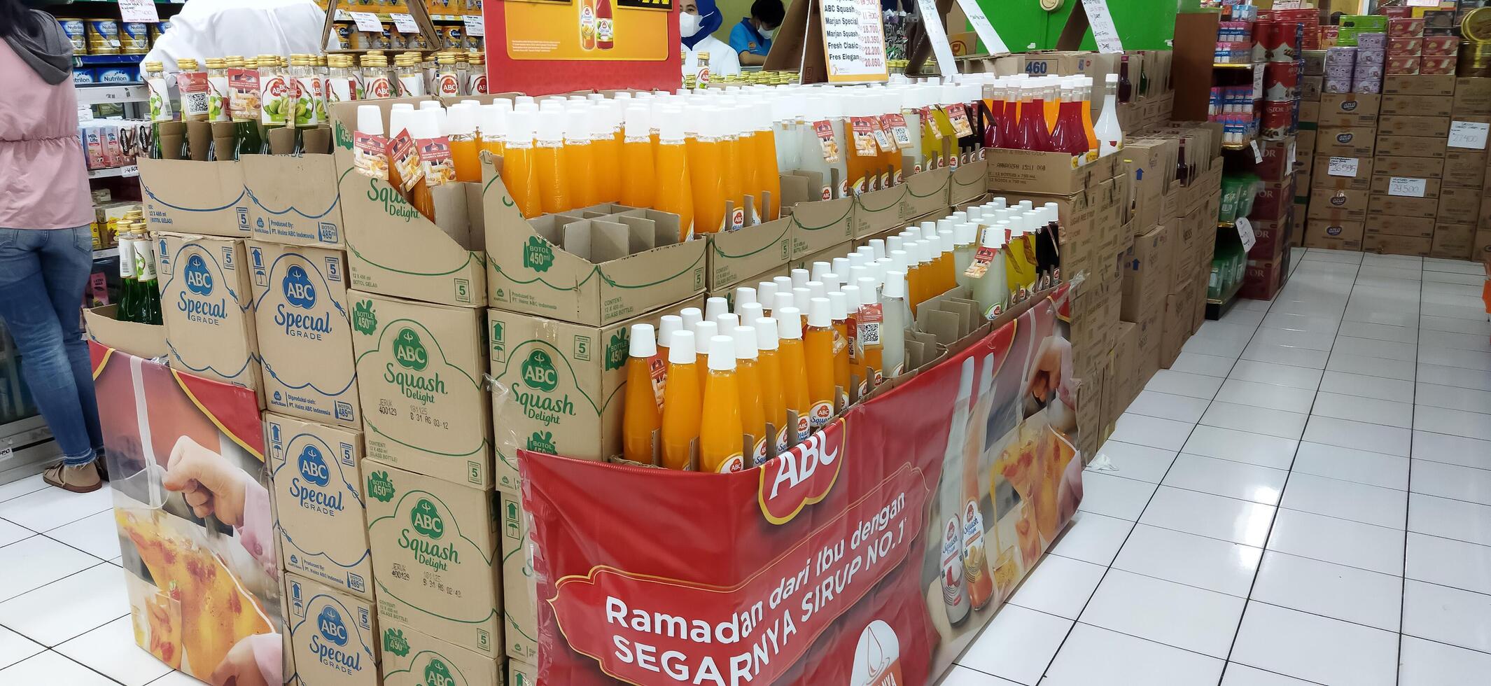 Surakarta, Indonesia, March 11, 2023. Stock of various kinds of syrup in the supermarket to welcome the month of Ramadan and Eid al-Fitr. Luwes Mall. photo