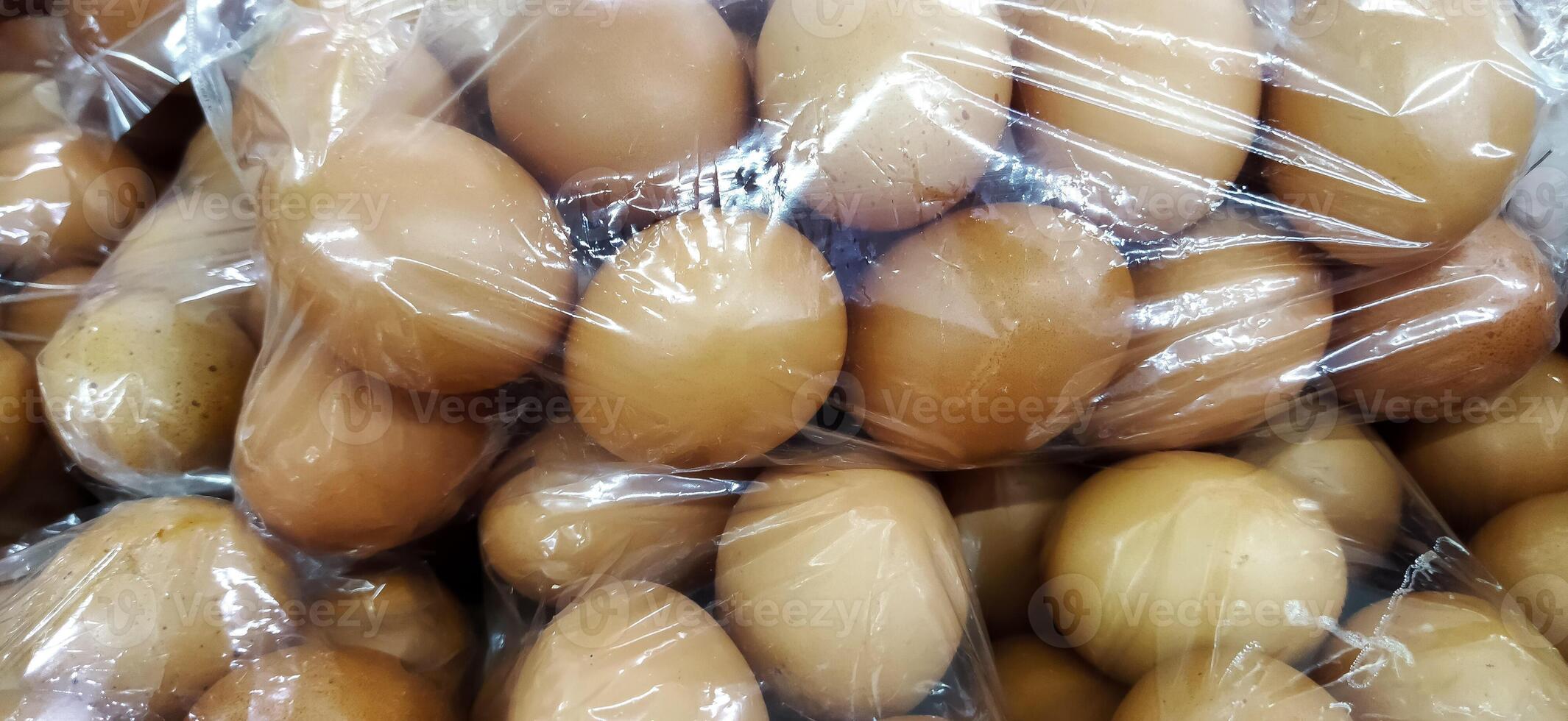Display of raw chicken eggs in supermarkets photo