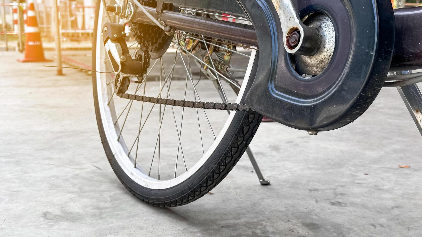 Close up parts of traditional dark brown bicycle photo