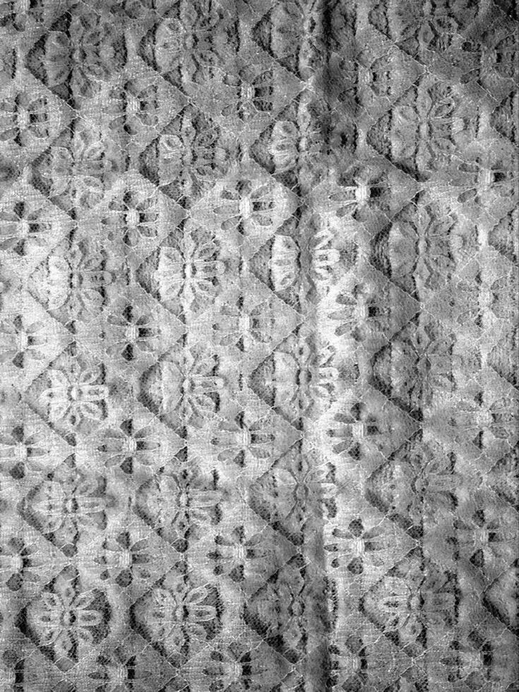 Abstract fabrics black and white background. Textile decoration close view photo