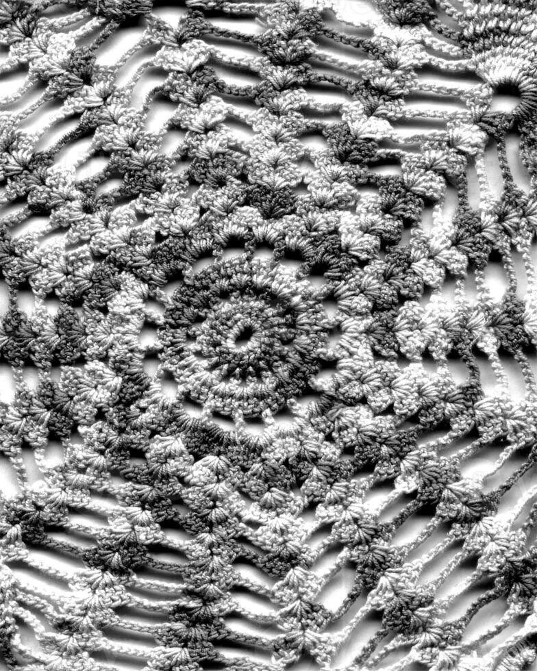 Abstract fabrics black and white background. Textile decoration close view photo