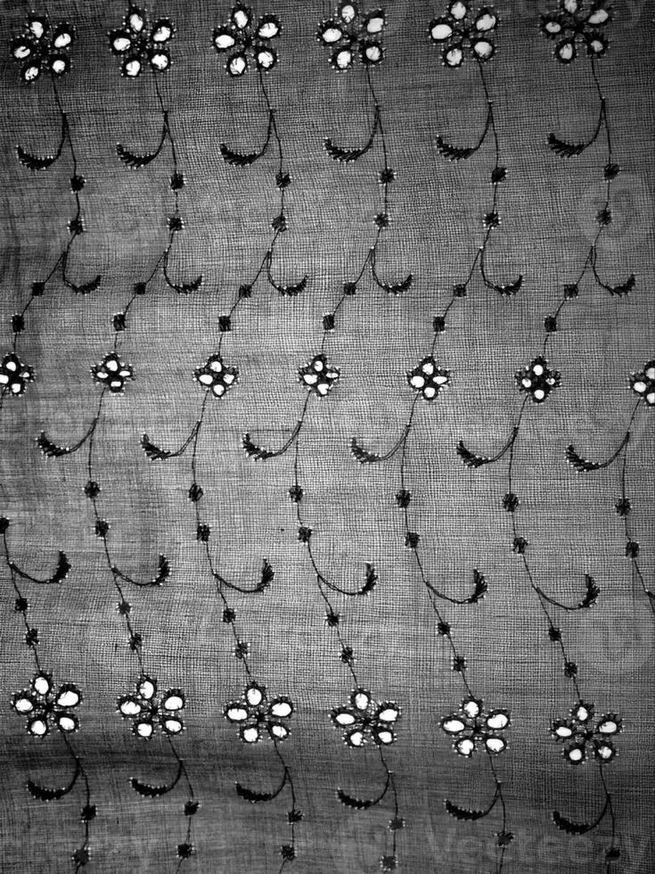 Abstract fabrics black and white background. Textile decoration close view photo