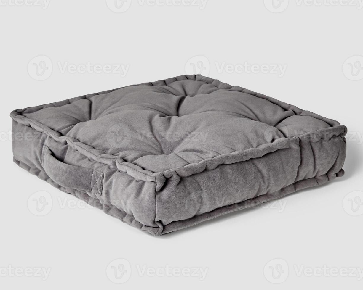 Soft gray velour seat cushion with piping and handle photo
