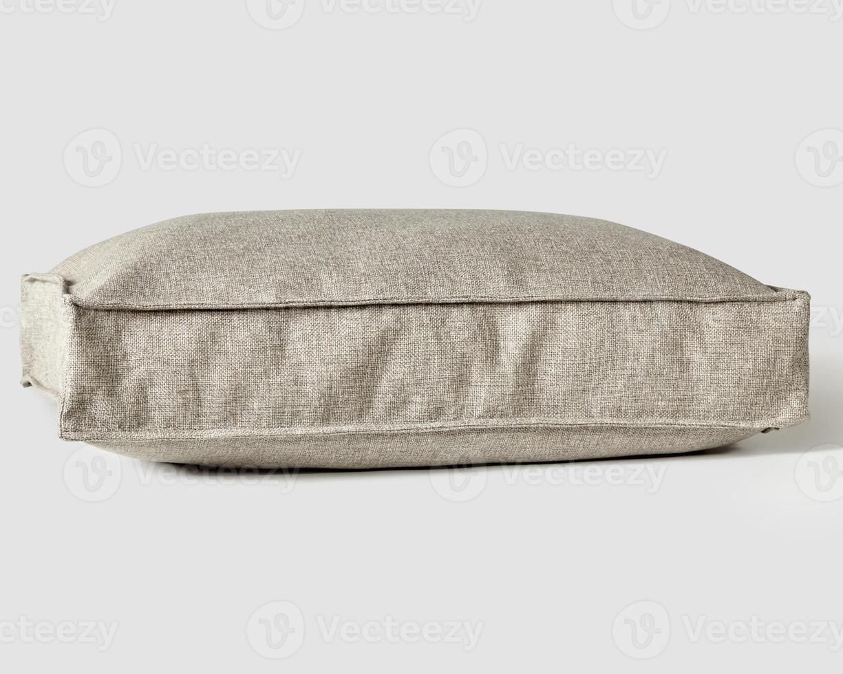 Soft pillow for sofa with cover of gray plain fabric photo