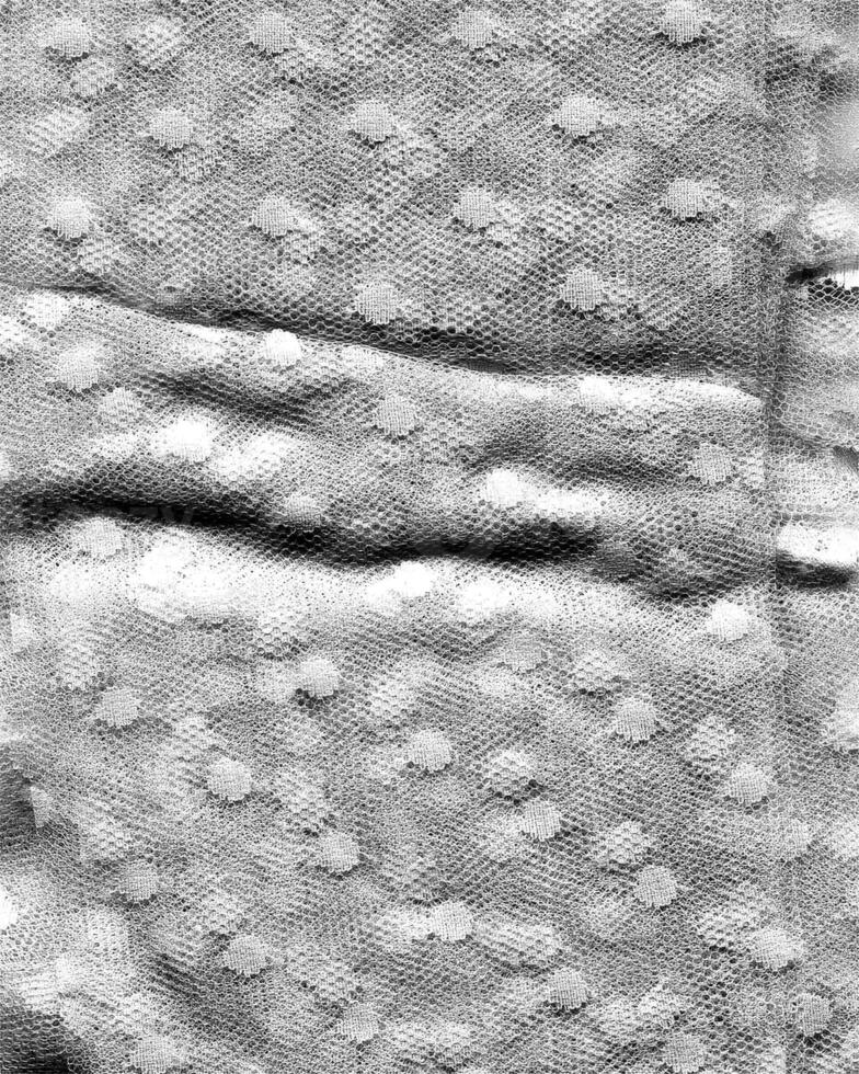 Abstract fabrics black and white background. Textile decoration close view photo
