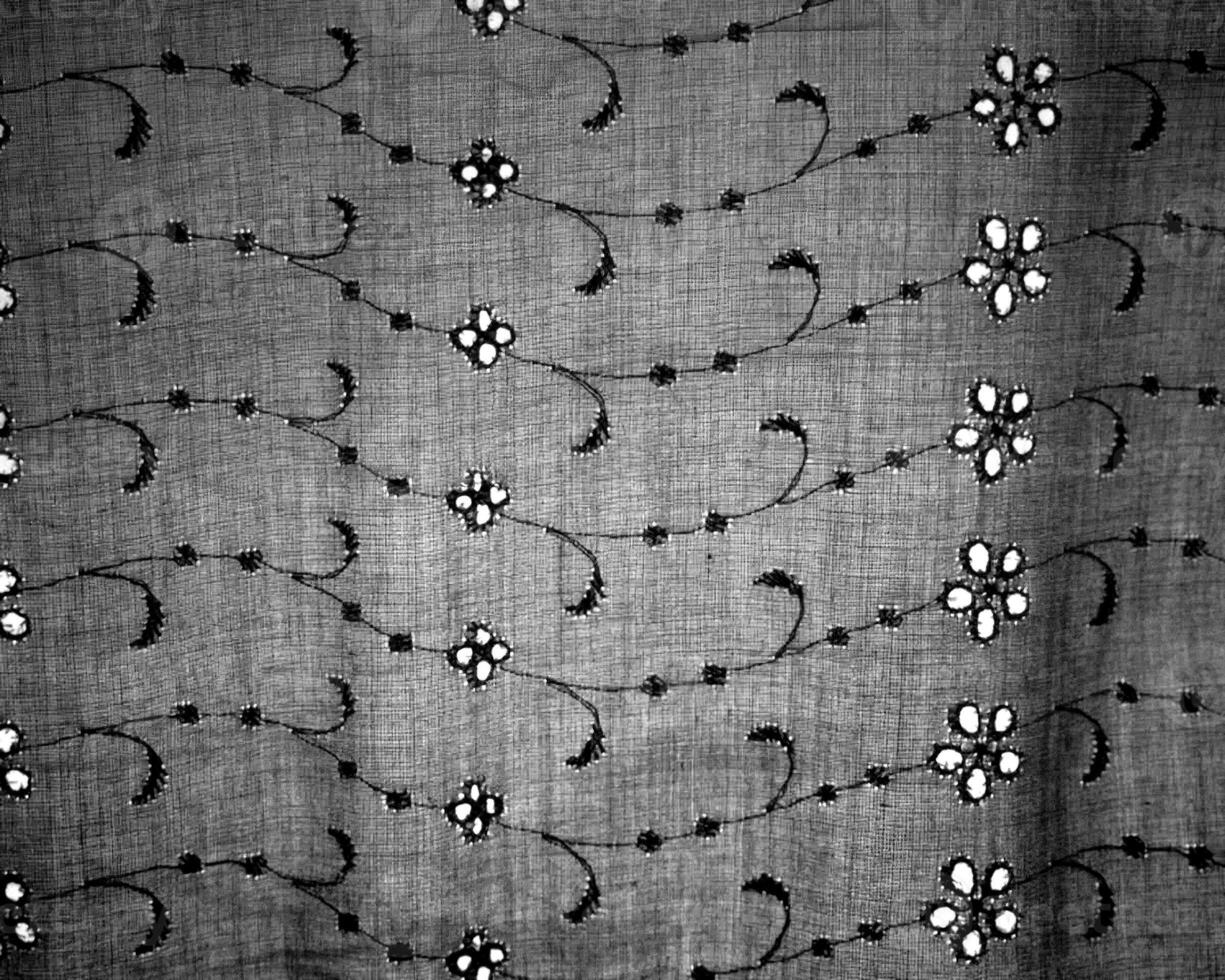 Abstract fabrics black and white background. Textile decoration close view photo