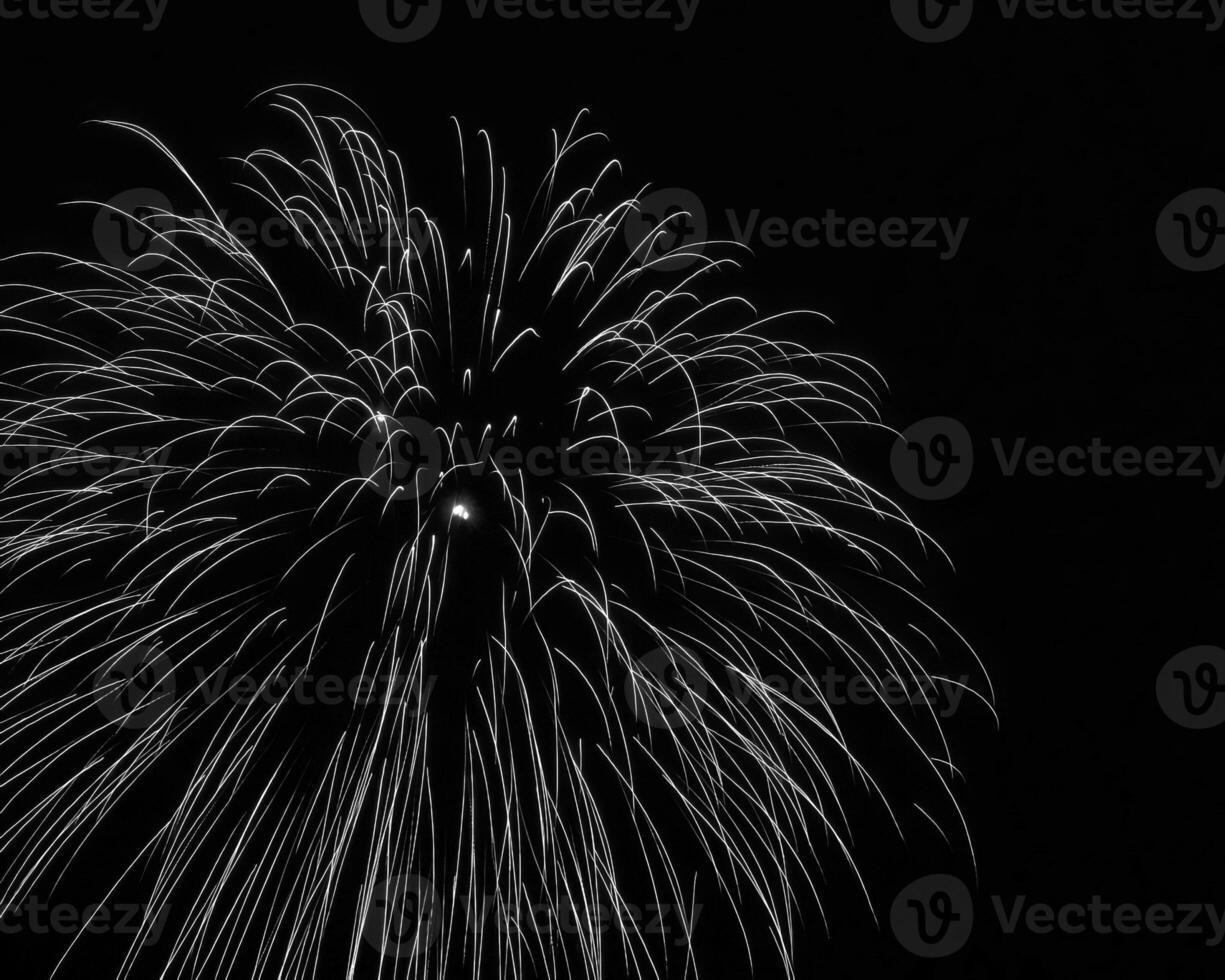 Fireworks black and white monochrome background, salute in the sky during celebration photo