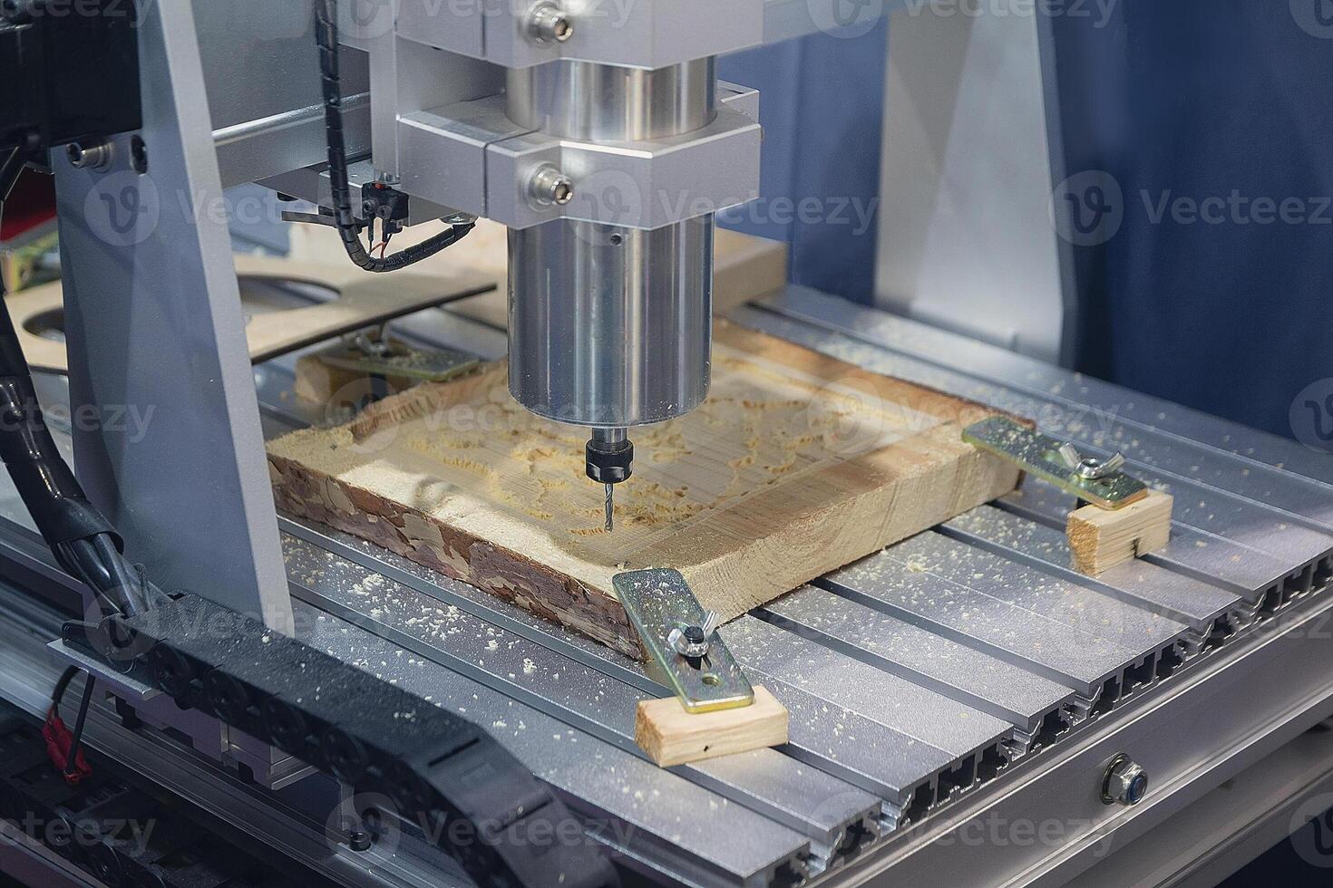 Wood carving machine. Modern automatic woodworking machine with CNC photo