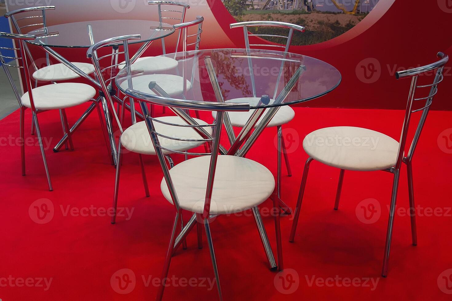 Tables, chairs and red carpet in the modern buffet photo