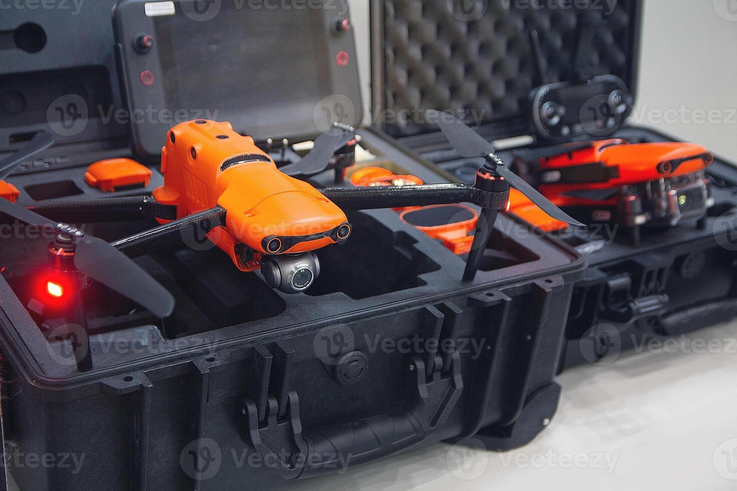 A drone with a camera in a box on a store shelf photo