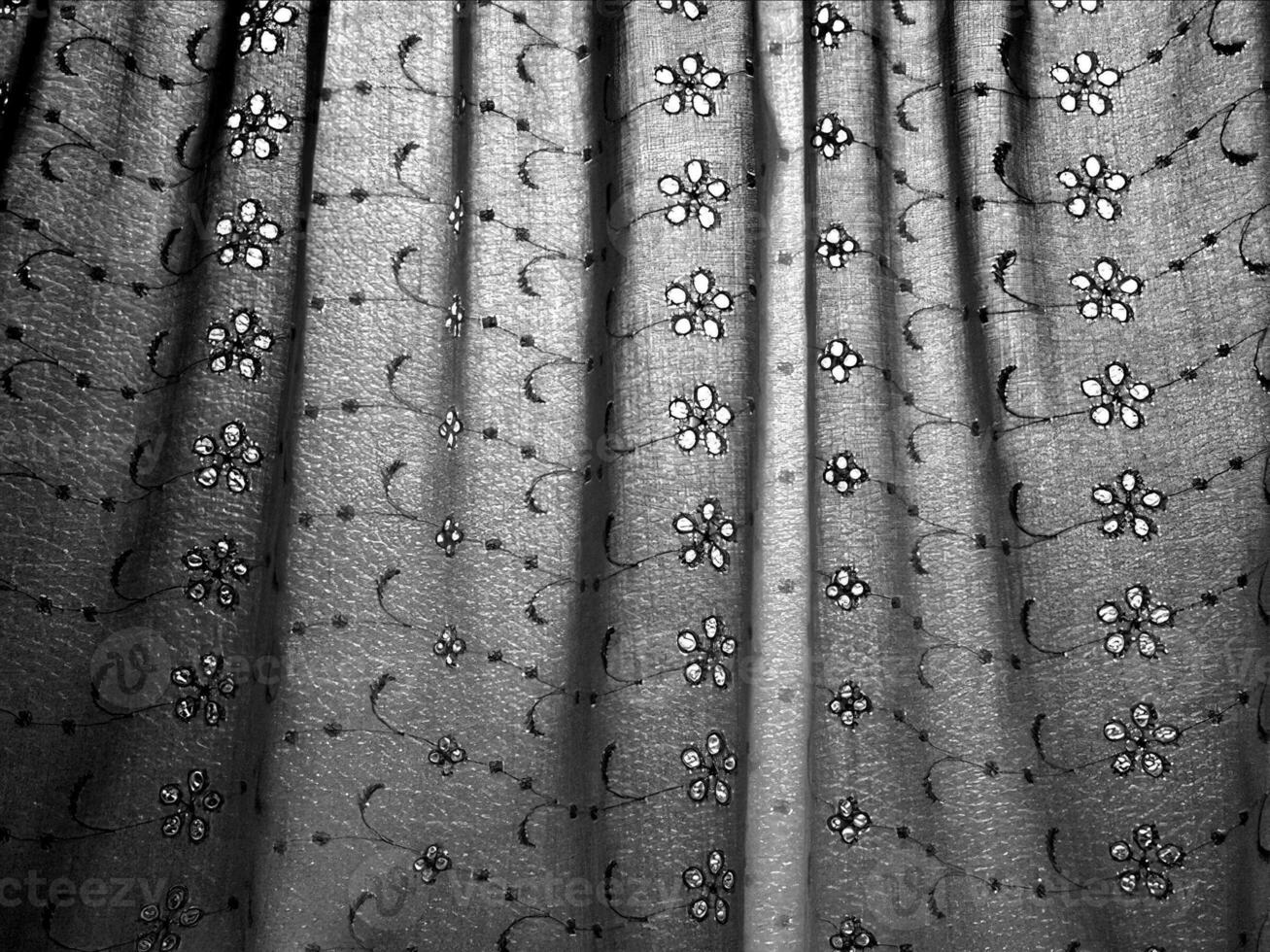 Abstract fabrics black and white background. Textile decoration close view photo