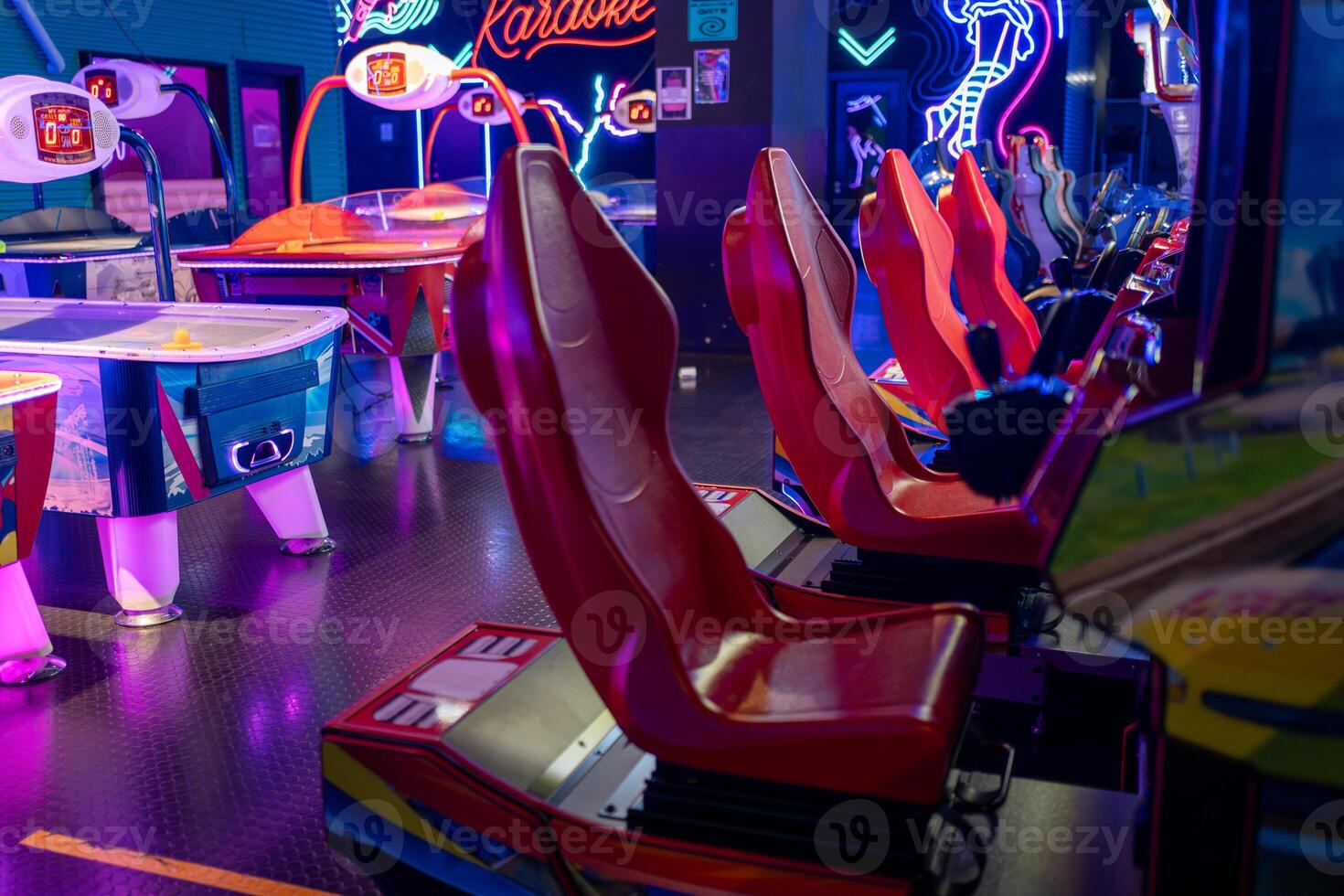 Colorful arcade games create a lively atmosphere with visual effect lighting photo