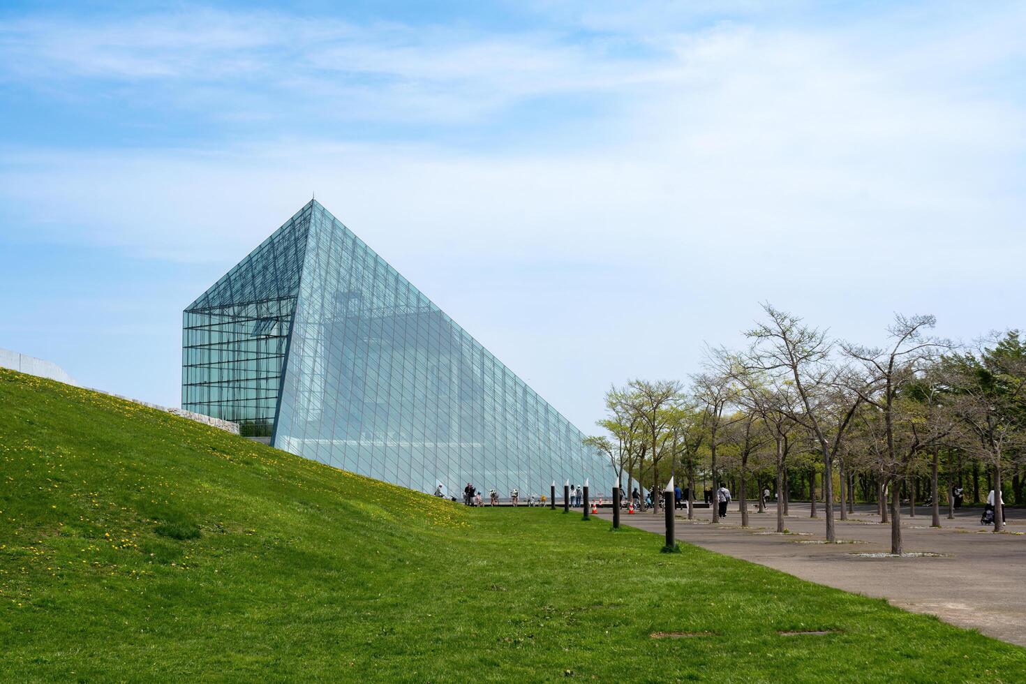 SAPPORO, JAPAN - 05 MAY 2024 . The symbol of Moerenuma park, the glass pyramid Hidamari, on February 5 in Sapporo. The glass pyramid is multi-purpose space, such as cultural activities and museum photo