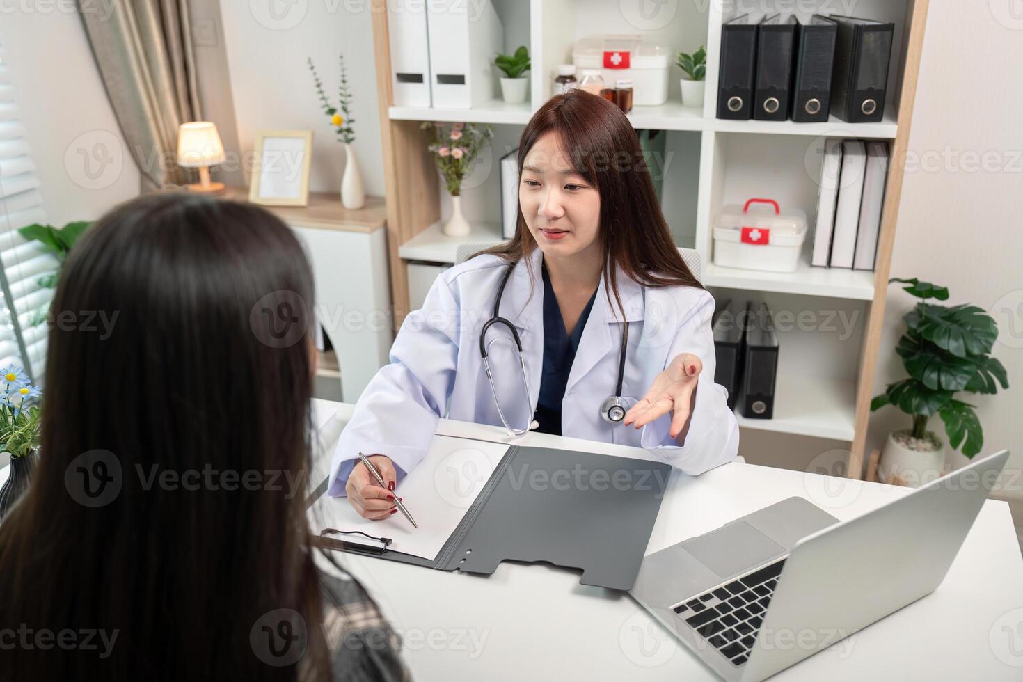 Doctor Consulting Patient in Modern Office, Discussing Medical History and Current Condition, Professional Healthcare Interaction photo
