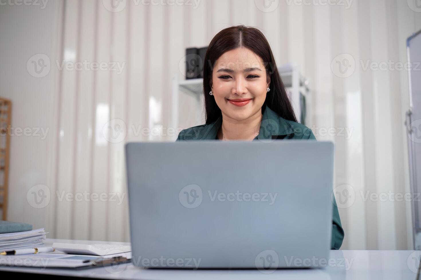 Business accounting woman counting on calculator working on financial document in hands closeup. Bookkeeping concept photo