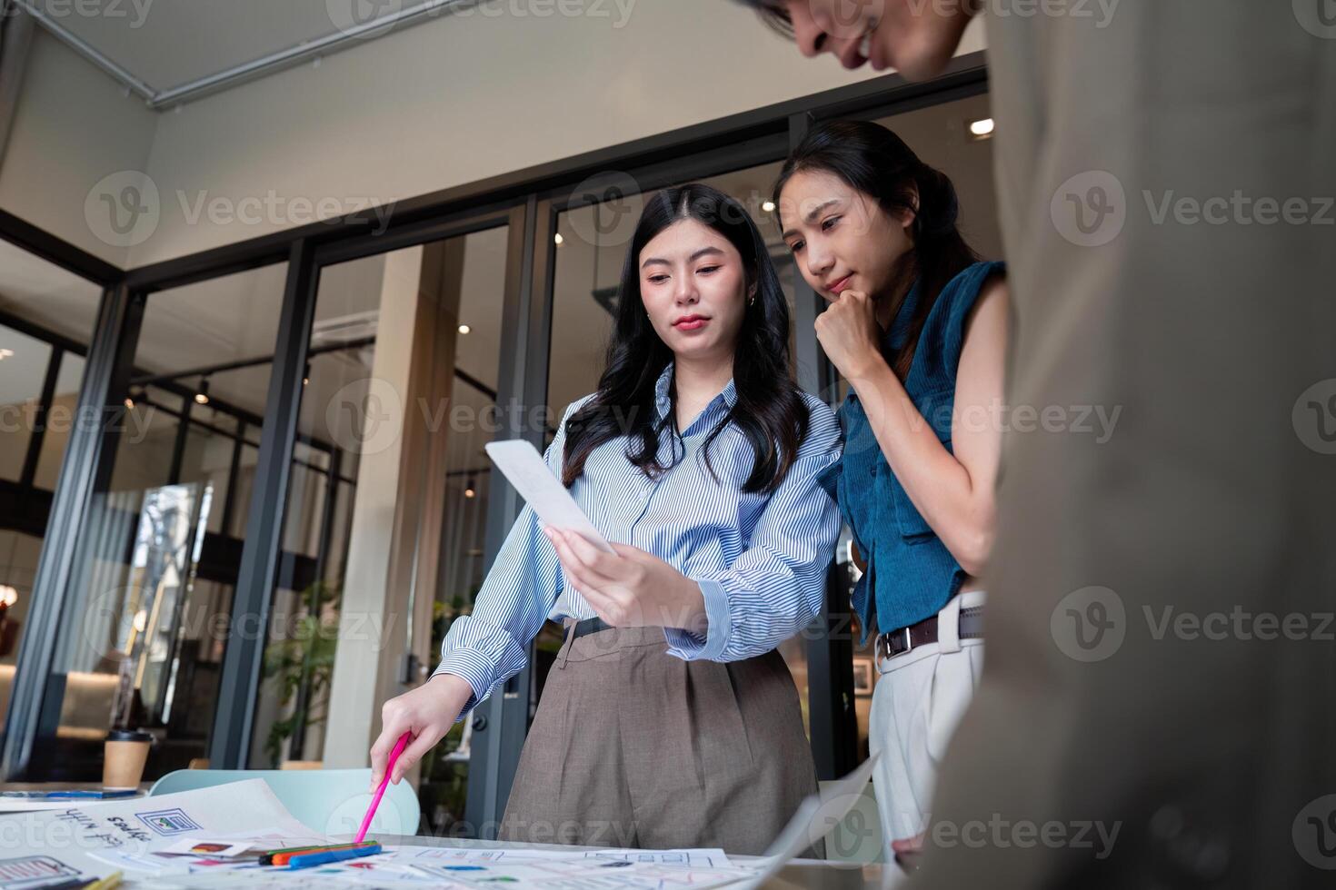 ux developer and ui designer presenting mobile app interface design on whiteboard in meeting at office. Creative digital development mobile app agency. digital transformation photo